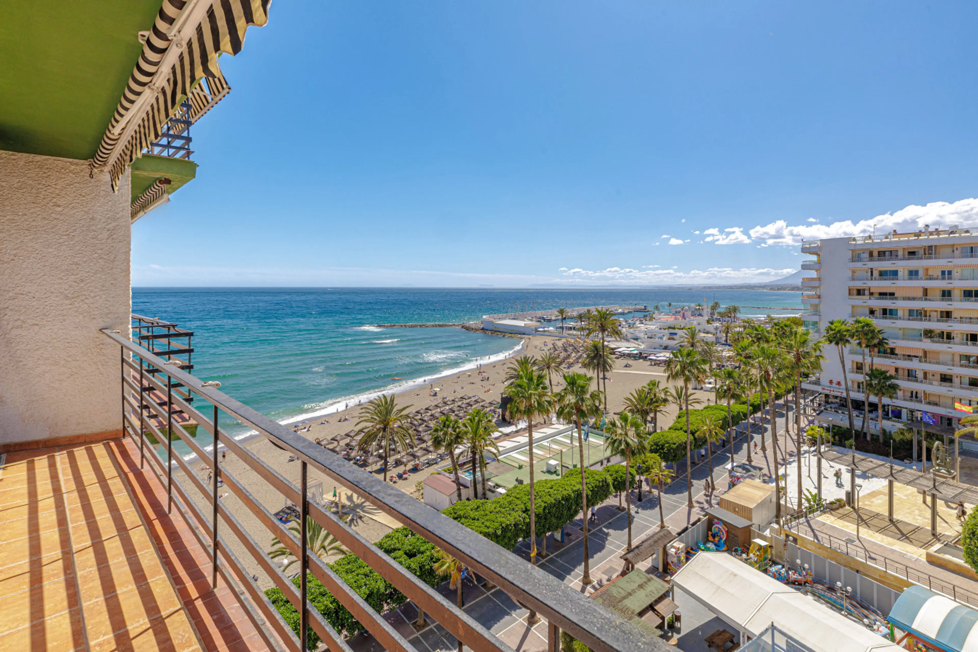 Panoramic Mediterranean Sea views from your private Marbella balcony. Step right out to the beach.