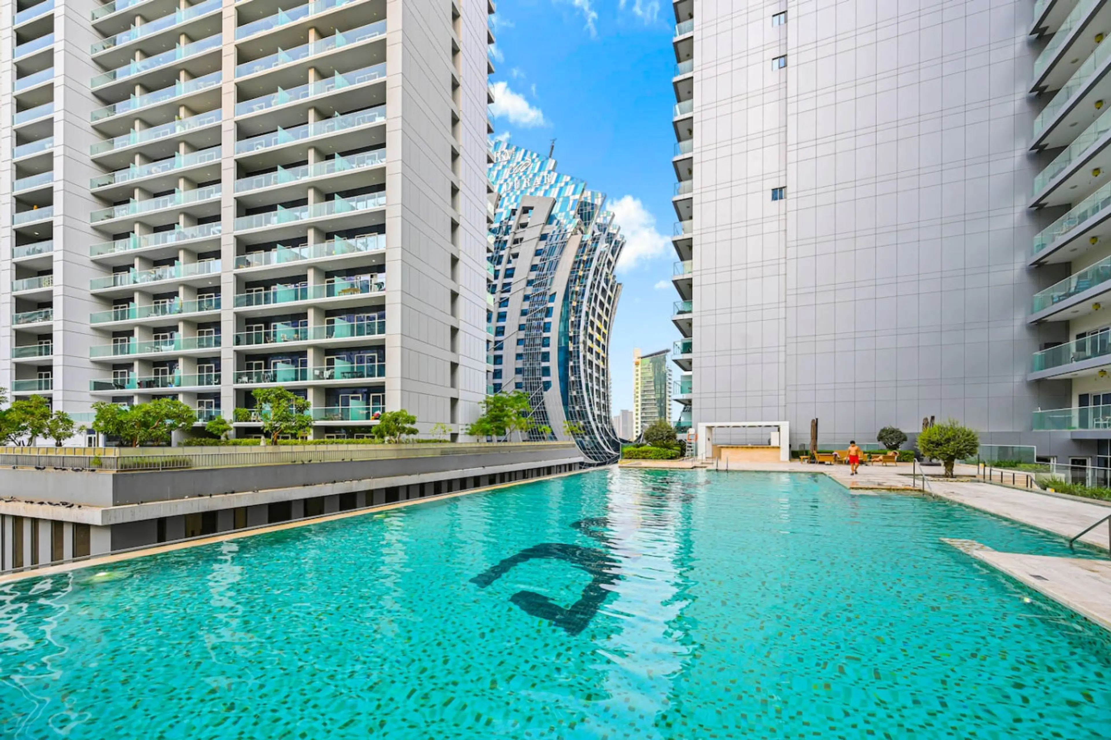 Luxury living includes access to this stunning night-lit pool.