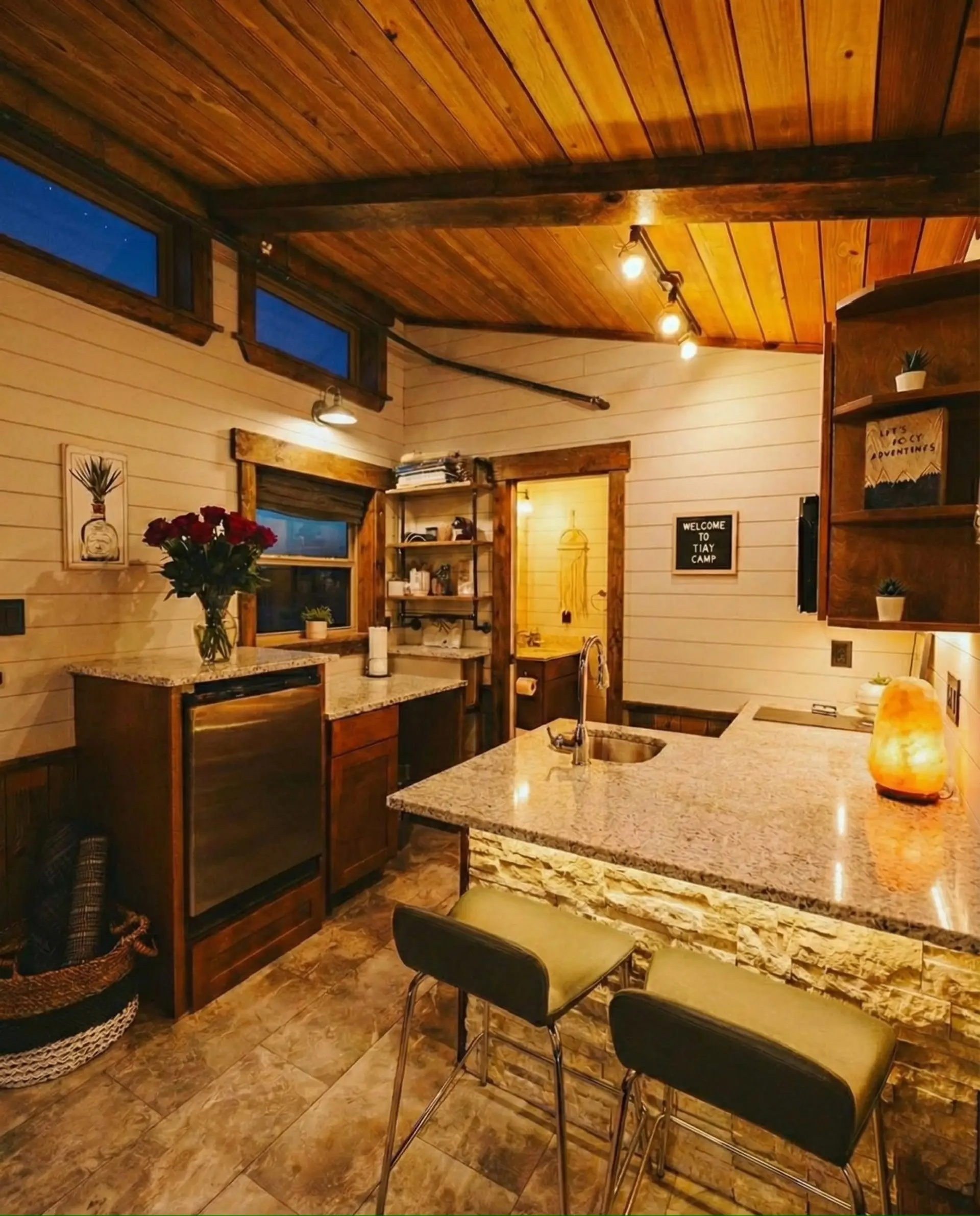 Thoughtfully designed with soaring ceilings, premium finishes, a fully equipped kitchen, and comfortable seating, Wonder makes tiny living feel spacious, modern, and inviting.