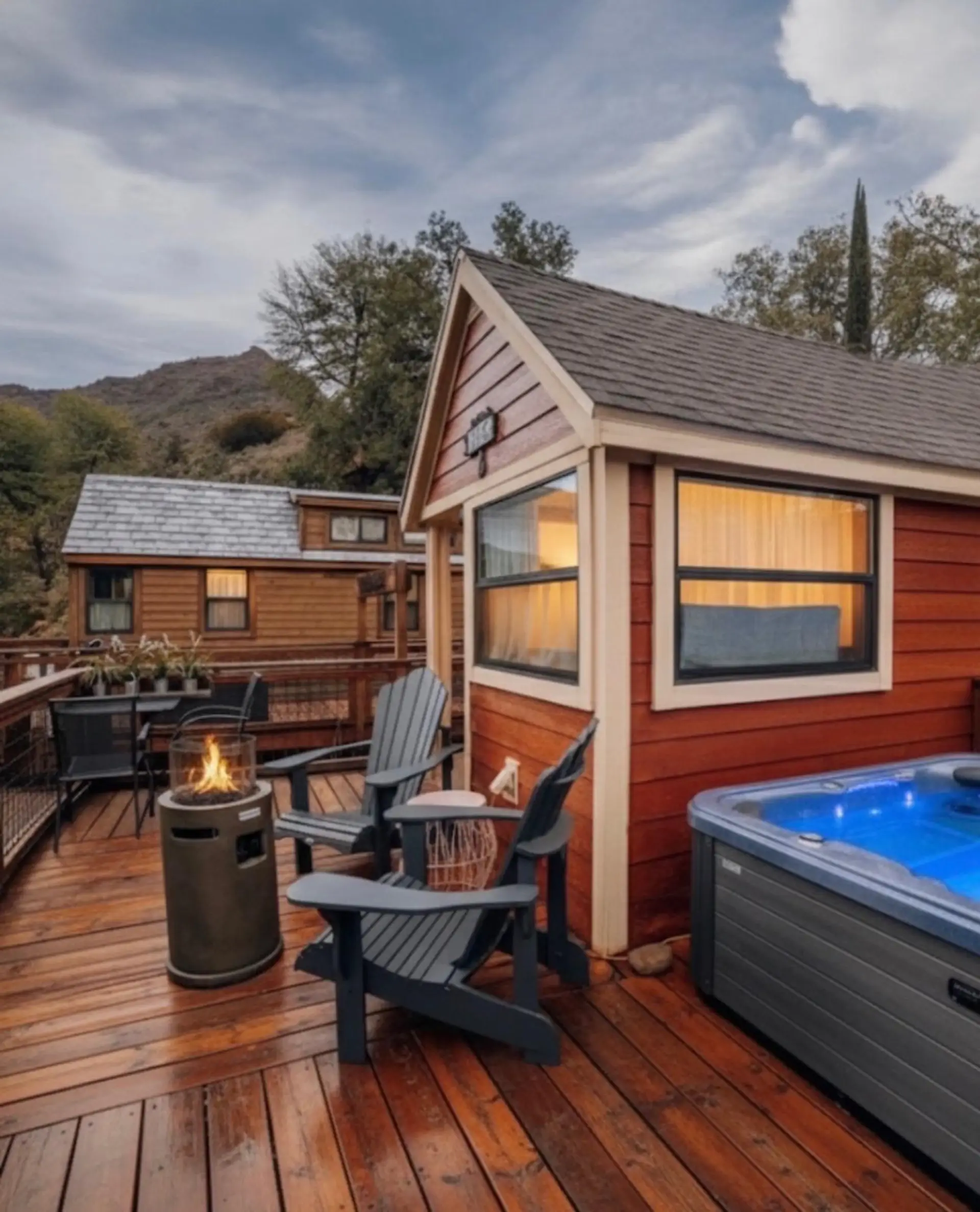 Enjoy your private hot tub and fire pit on the spacious deck.
