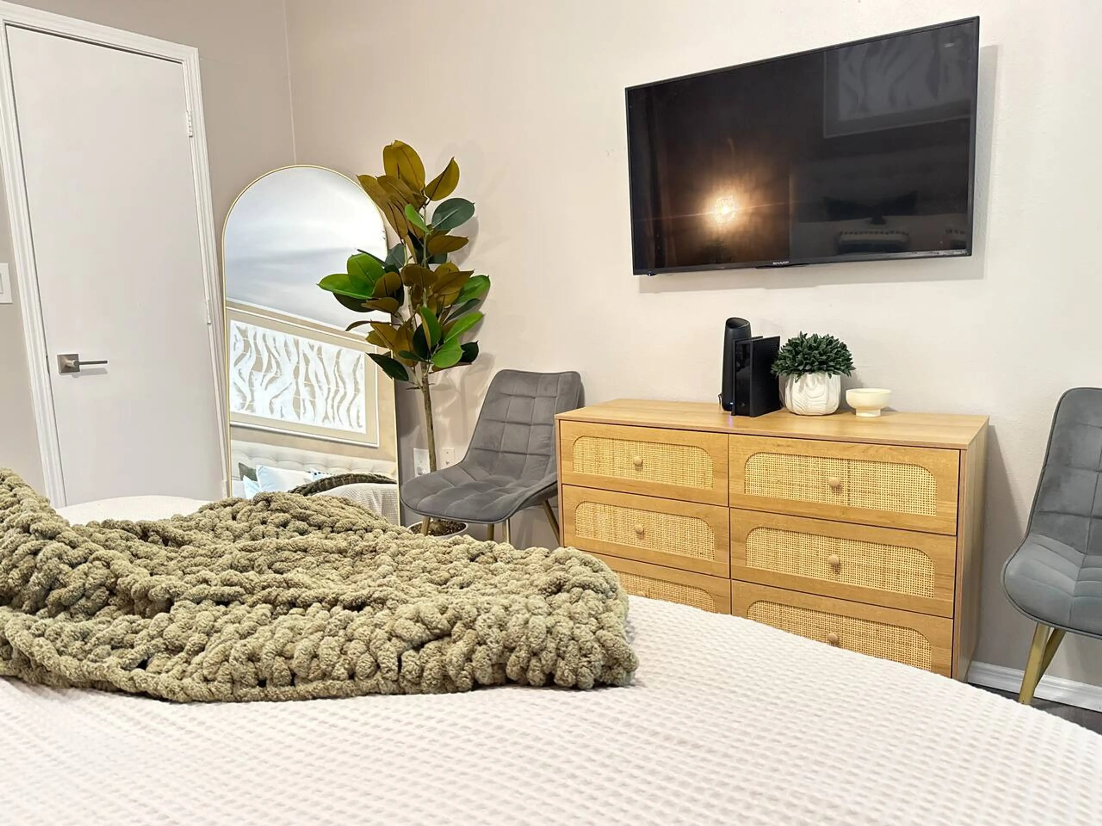 Sun-filled, serene, and thoughtfully styled with a full-body Miror and TV — your private retreat after a long day.