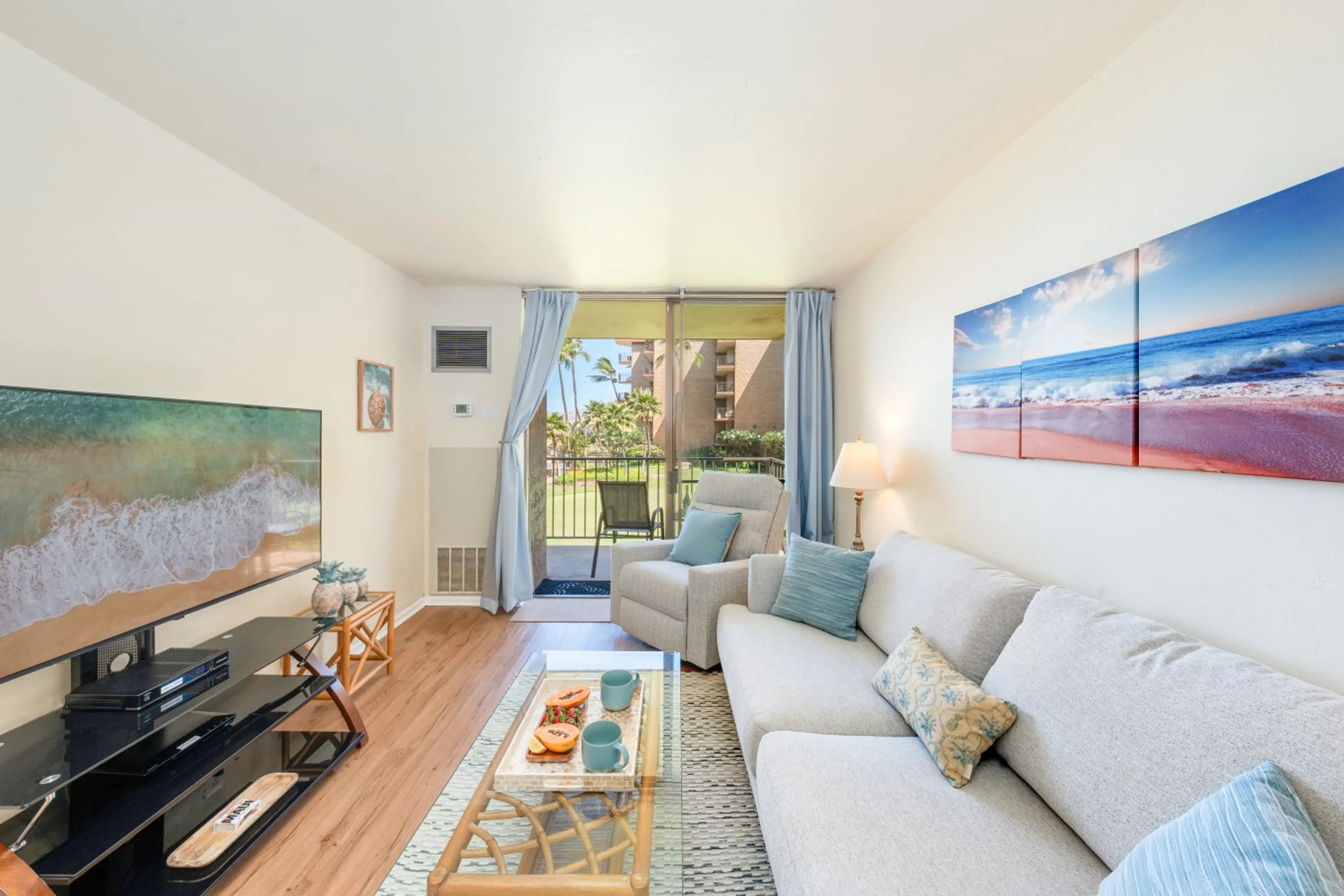 Spacious living room with updated furniture and decor