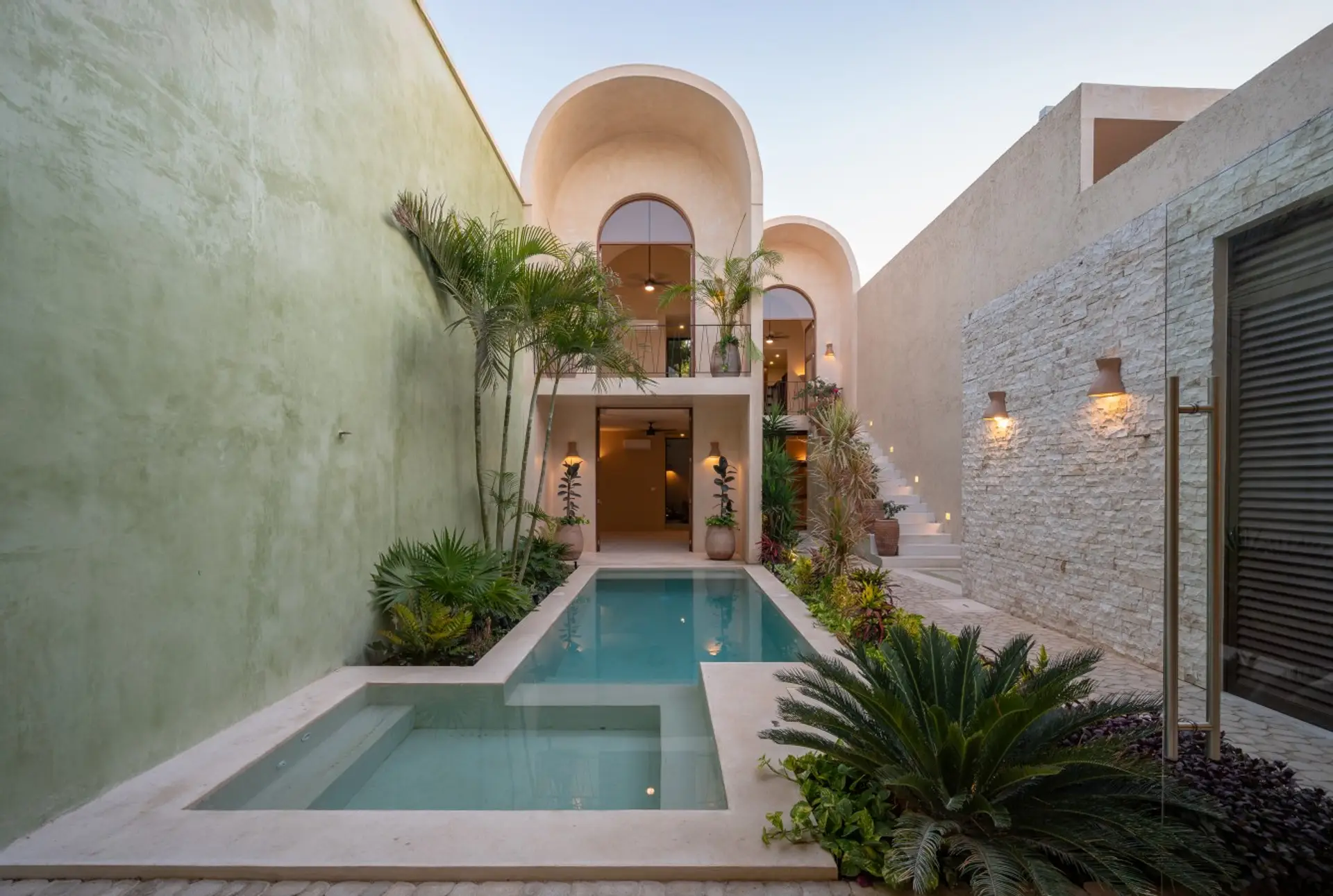 Outdoor Paradise: Dive into luxury with a stunning pool, lush greenery, and modern architecture!