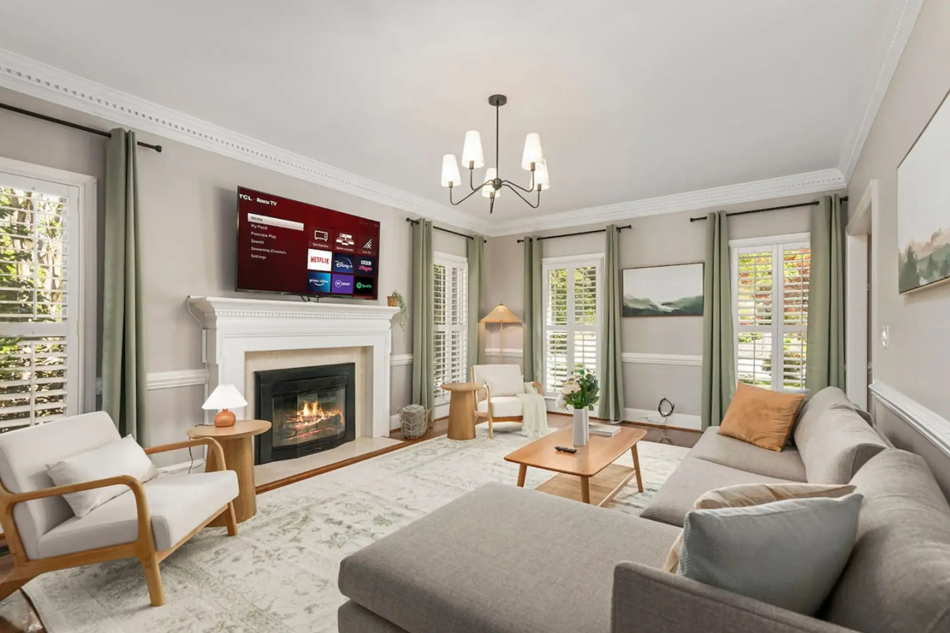 Tranquil and airy living room with fireplace