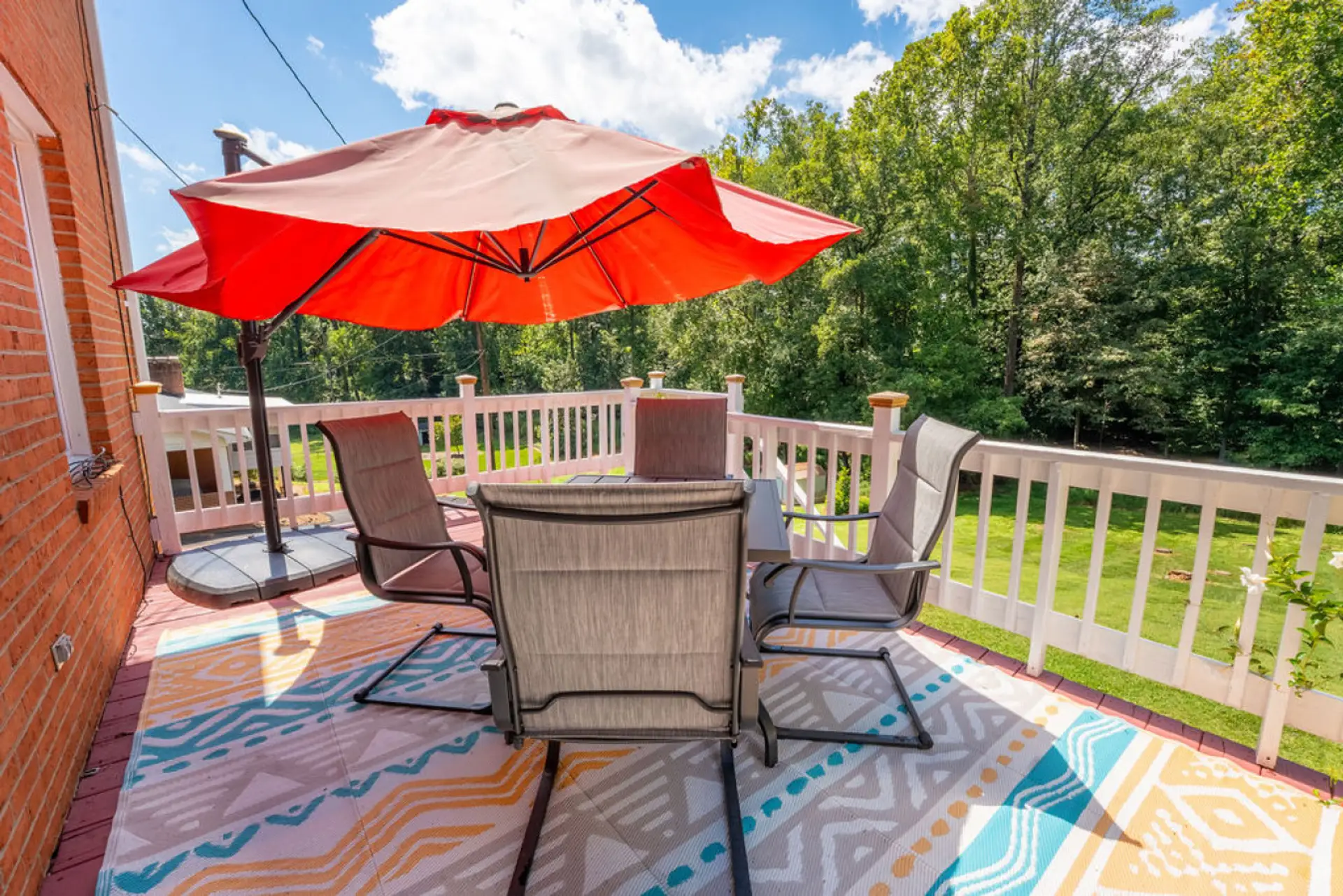Upper Deck | Outdoor Dining | Umbrella Shade & Scenic Views