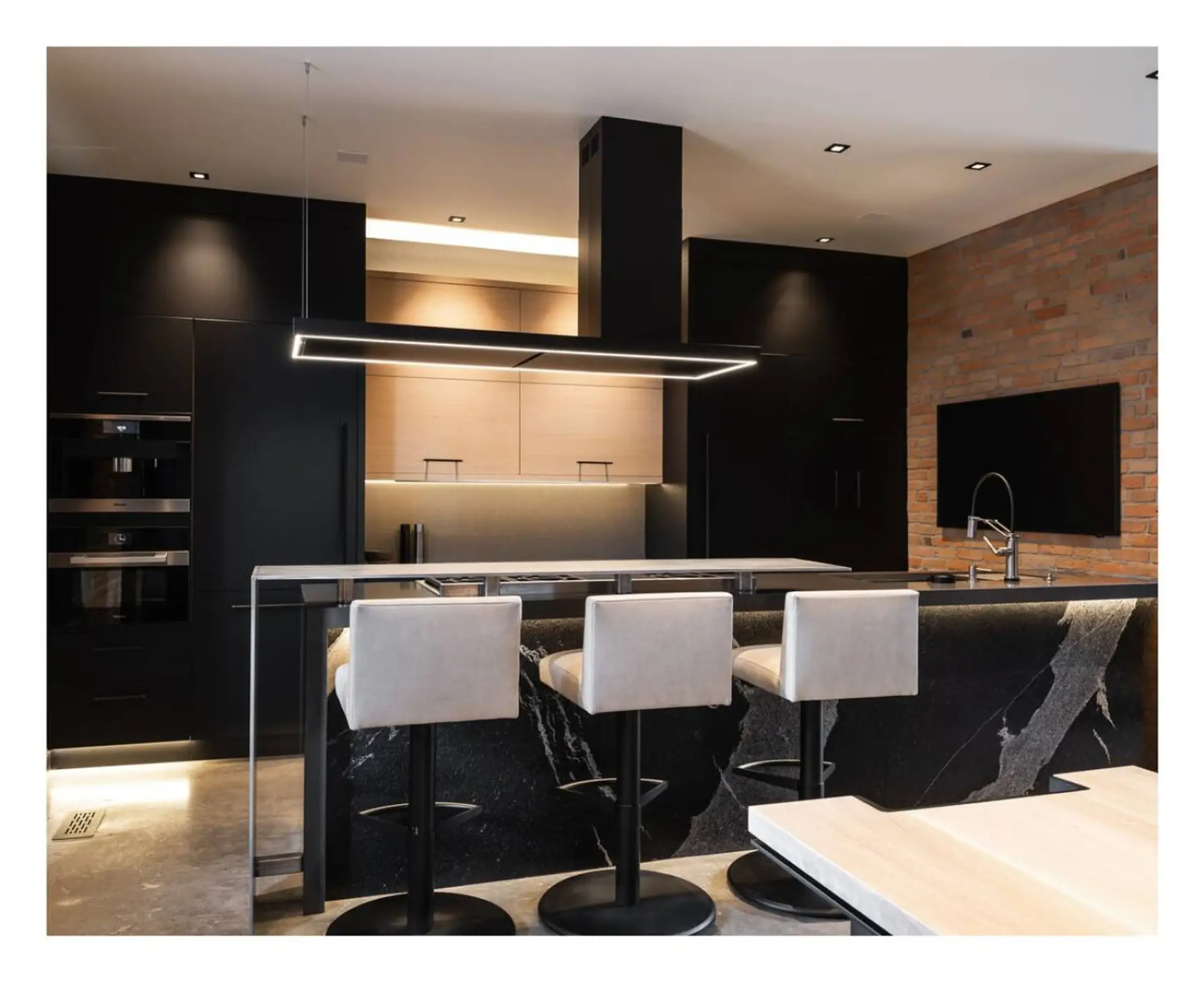 Indulge in the sleek elegance of our fully equipped kitchen, featuring contemporary design and state-of-the-art amenities, perfect for preparing gourmet meals during your luxurious stay.