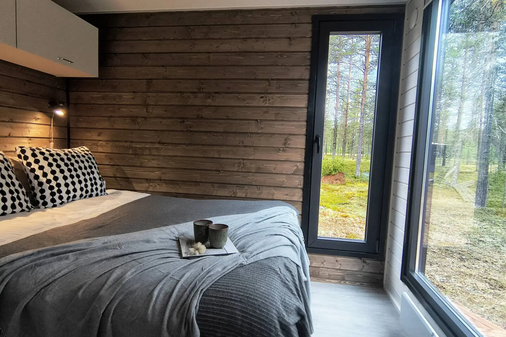 Cozy bedroom with forest view