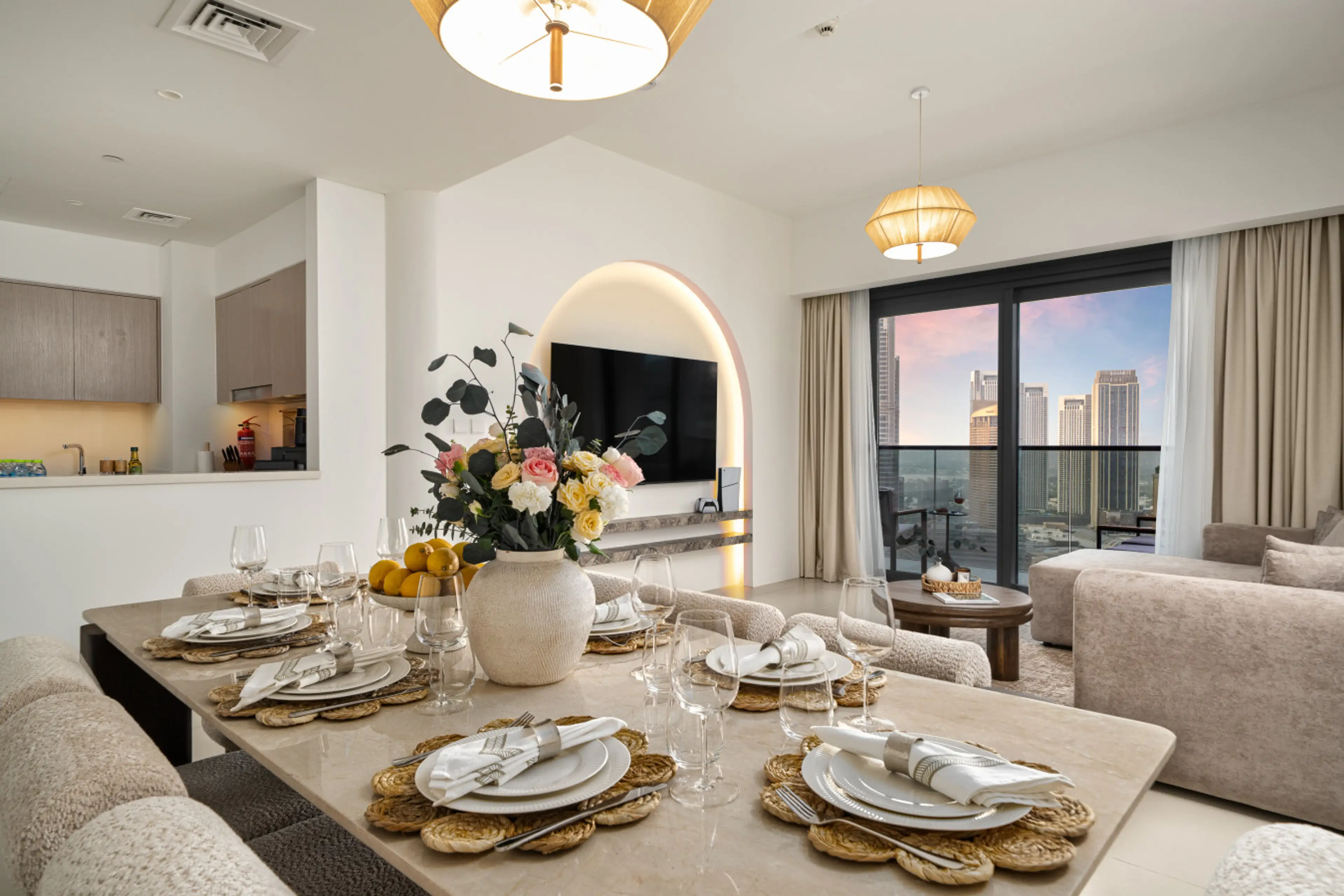This dining area and kitchen combination creates a welcoming space for both casual dining and entertaining.