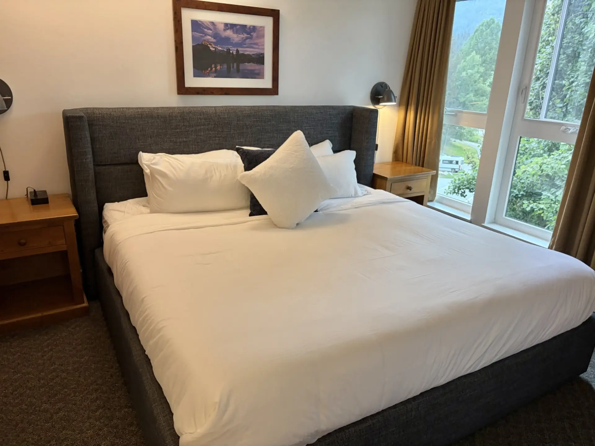 King size bed in the master bedroom with ensuite bathroom.