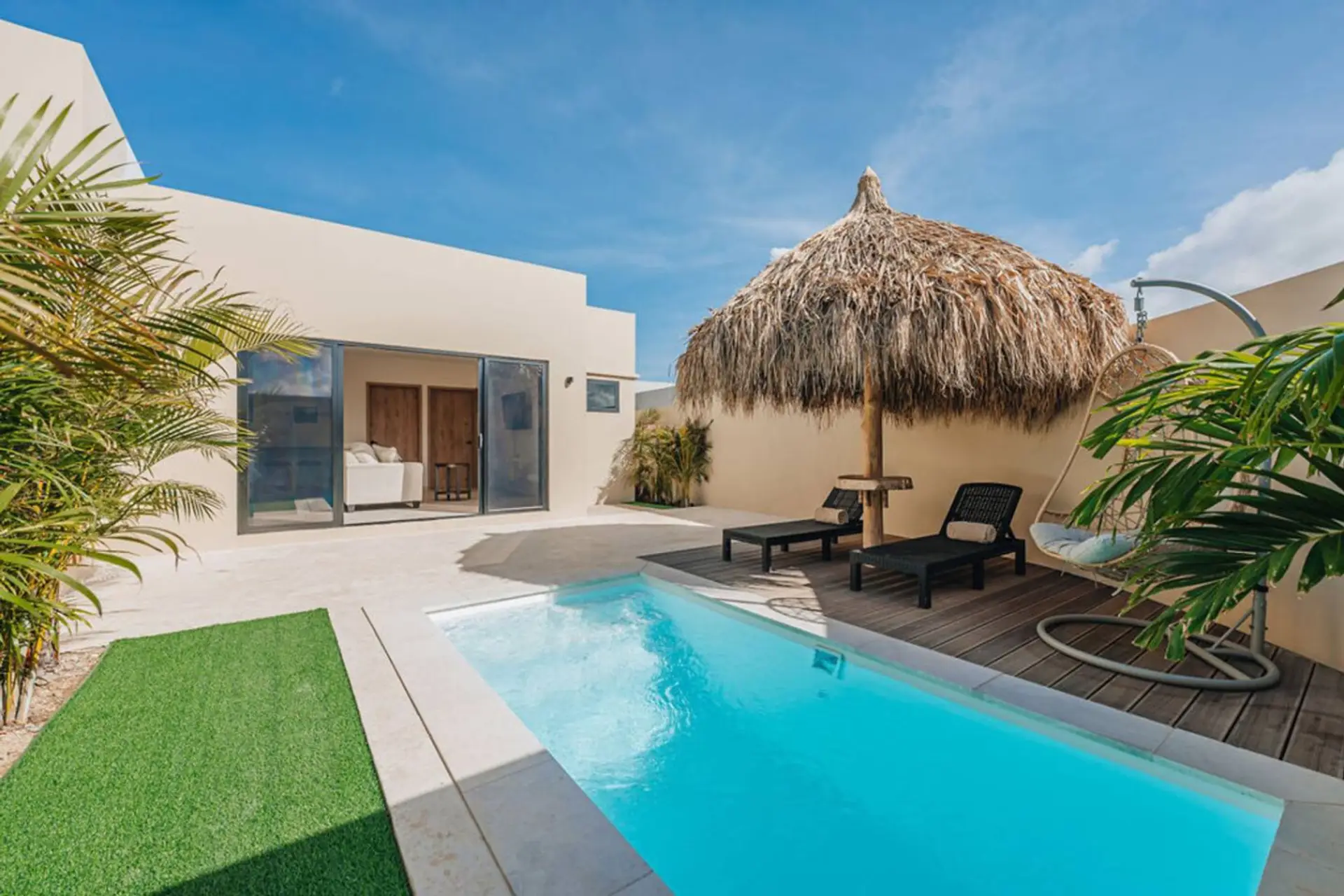 Soak up the Aruba sun in your secure, private pool area just steps from the living room.