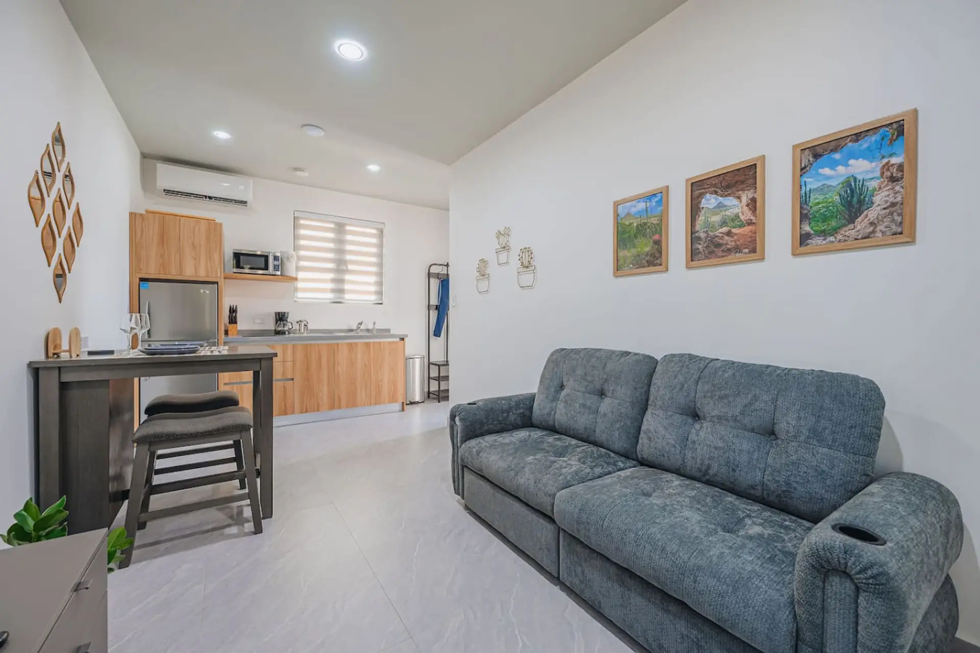Modern studio with cozy living room, full kitchen & stylish open-concept layout ✨ Perfect vacation rental for couples or weekend escapes.