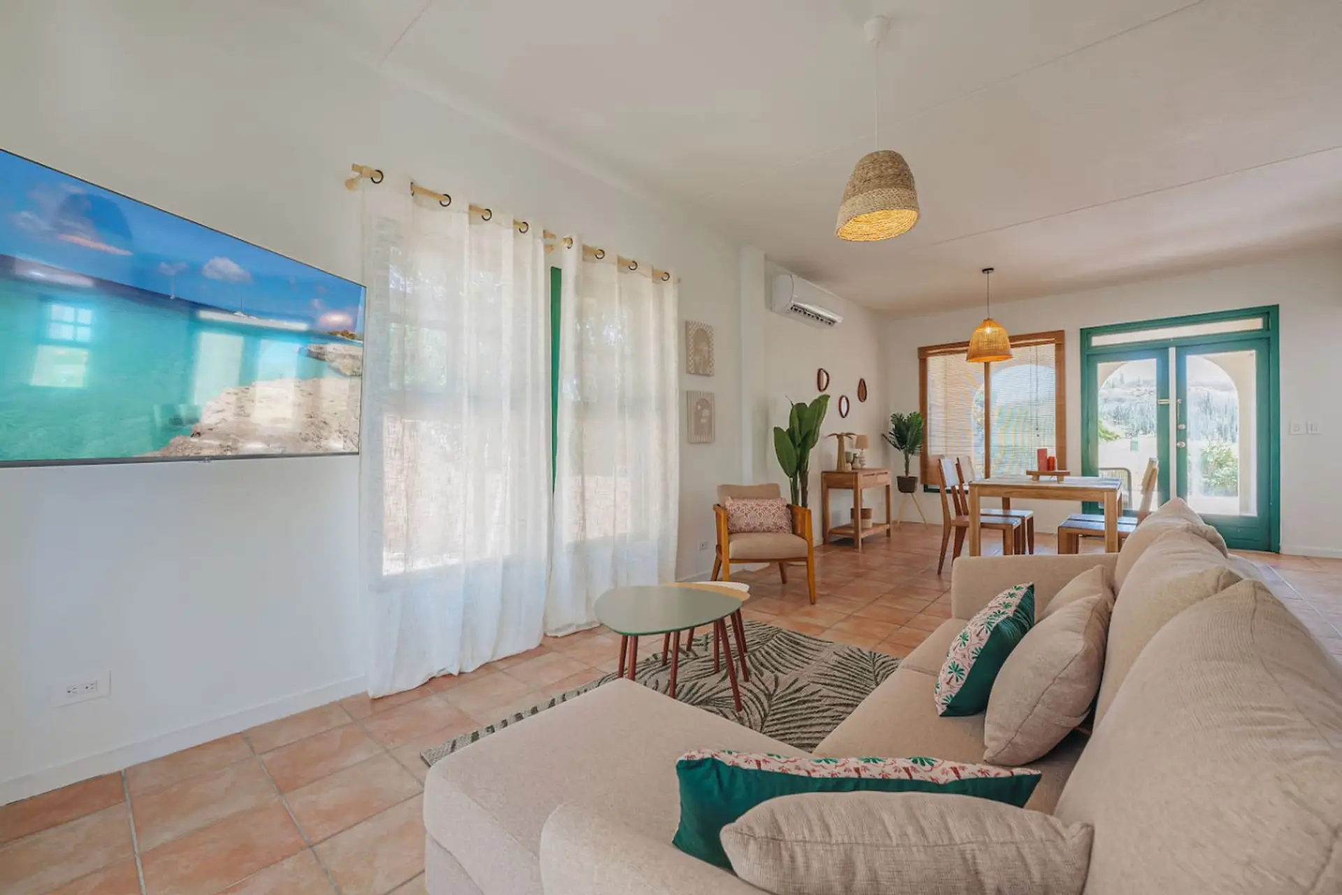 Bright, stylish coastal retreat with sunlit living spaces, cozy seating, and modern décor. Relax, dine, and unwind in comfort perfect for a peaceful beachside getaway.