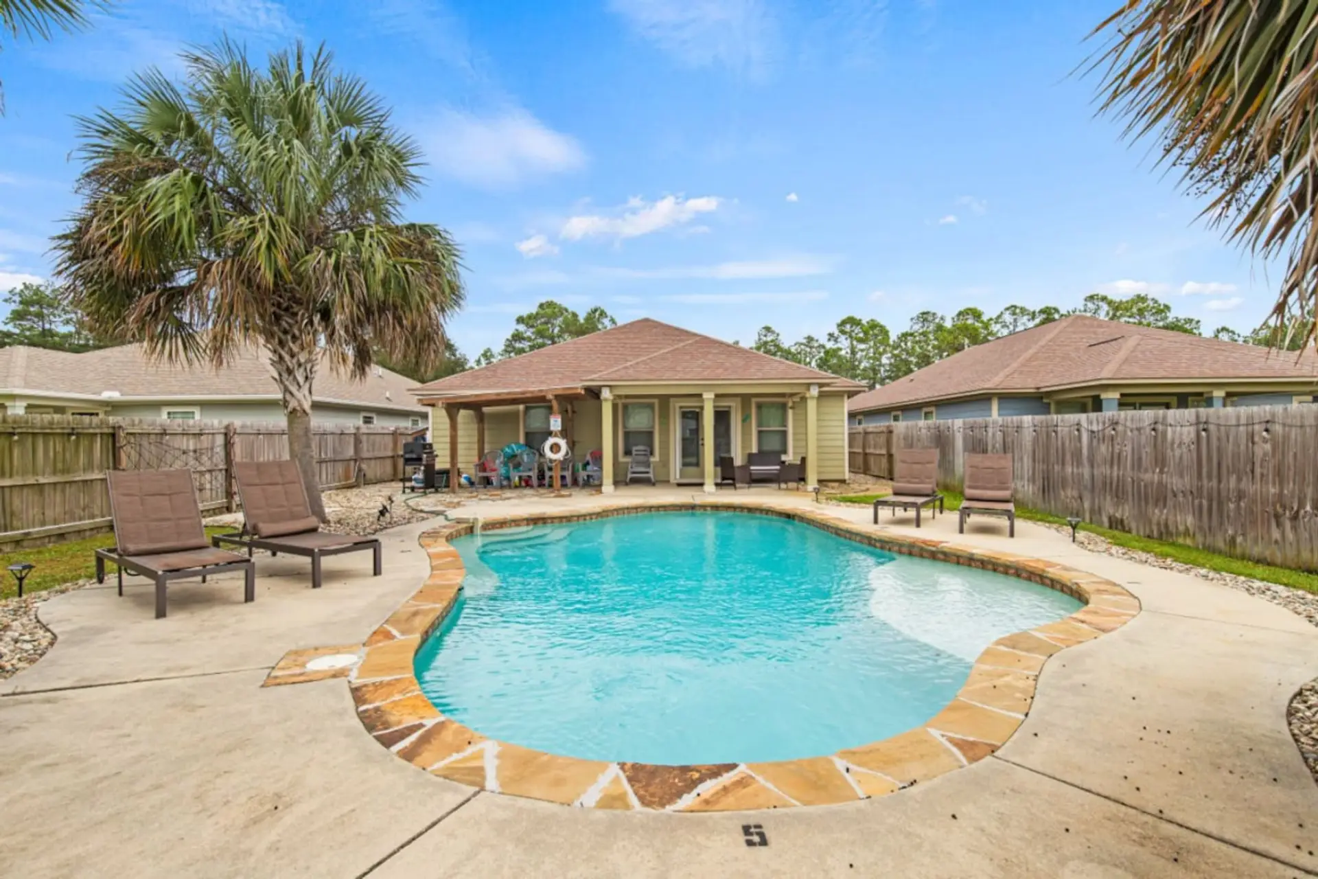 Immerse yourself in the warmth and charm of your exclusive pool area, boasting a comfy lounge and a fantastic grilling zone for entertaining guests.