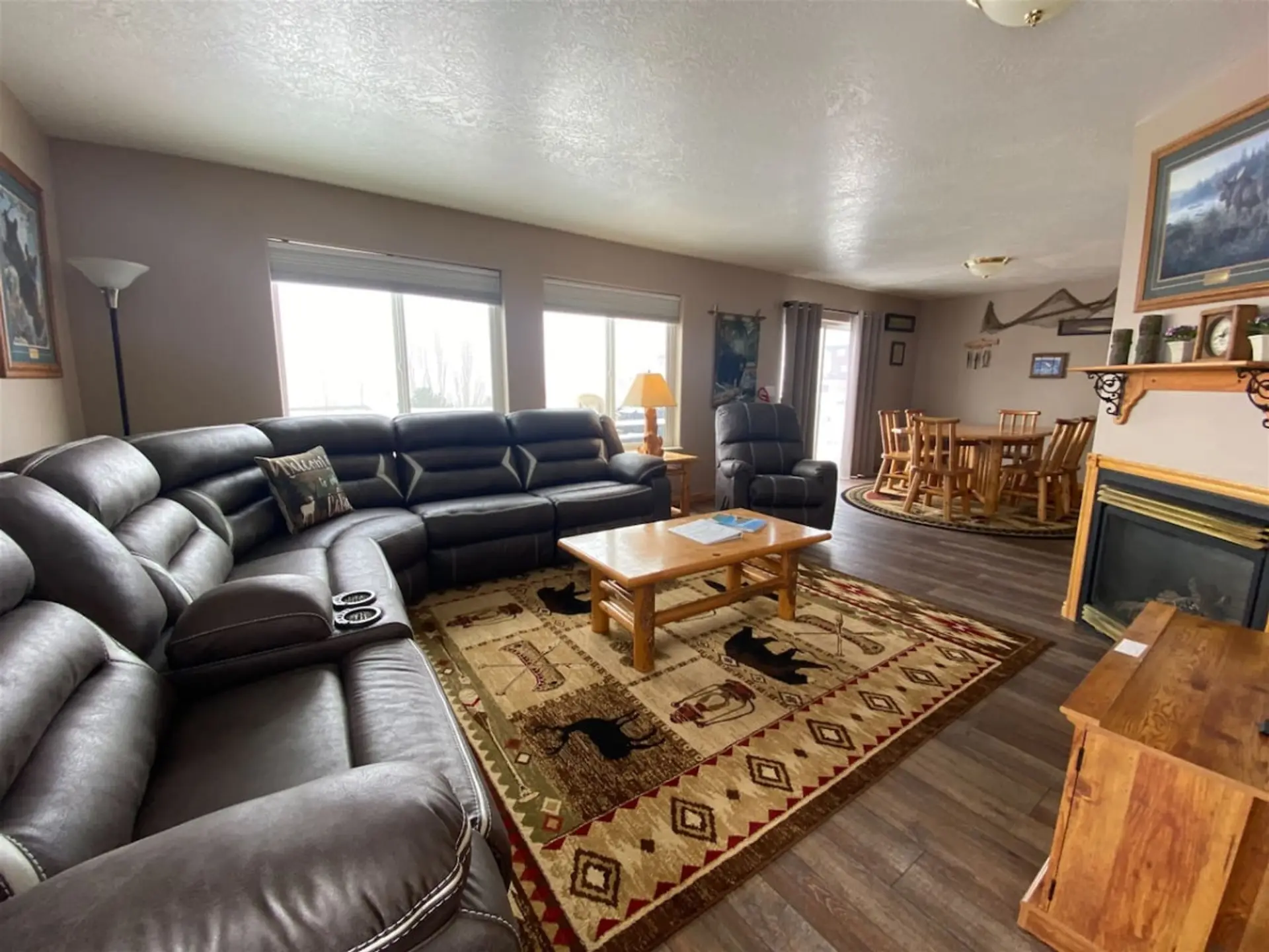 Warm, open living space with cozy seating, rustic charm, and room for everyone to gather