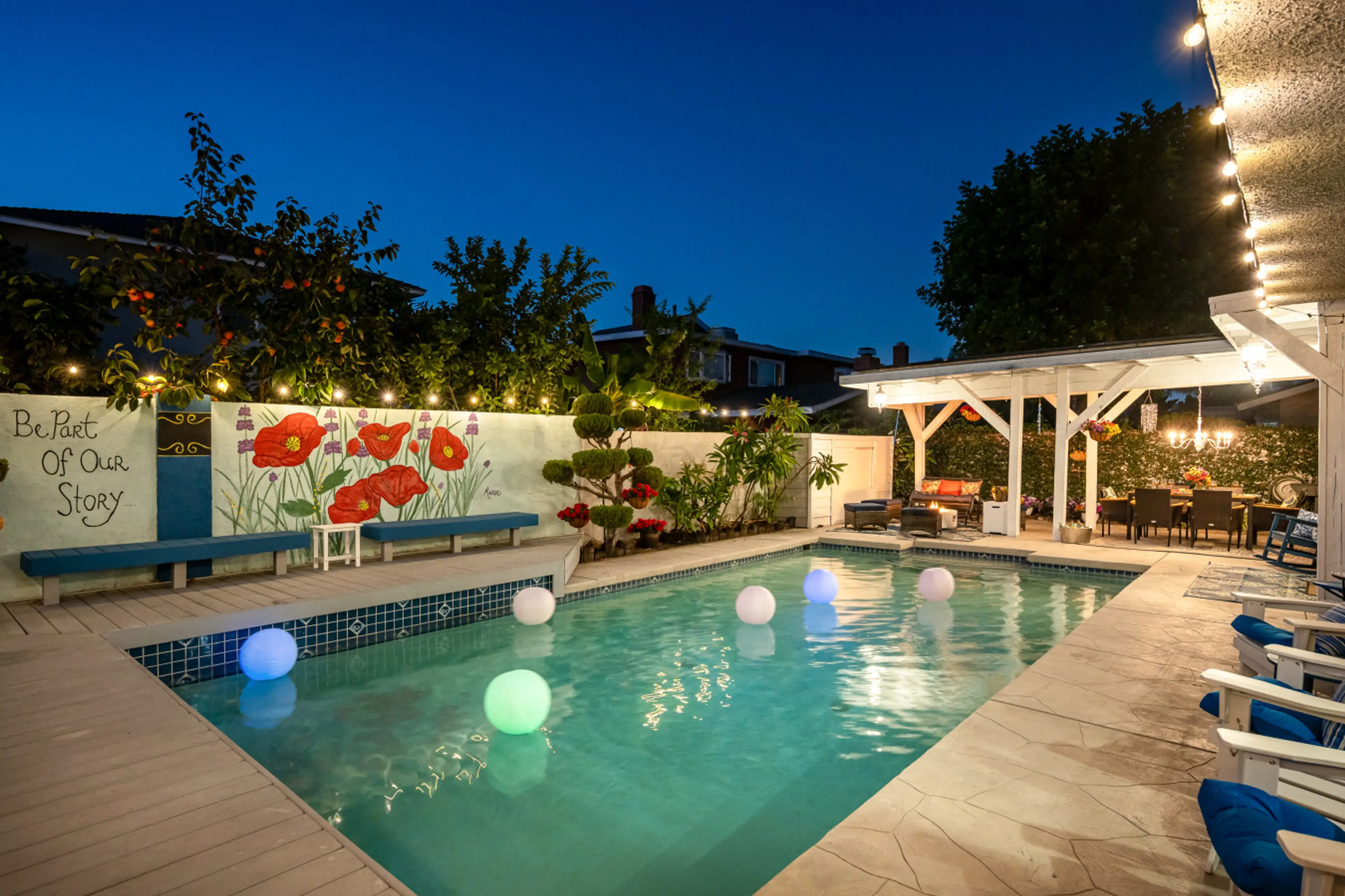 Welcome to Storybook Sunshine, our newest Stay Hello Sunshine escape, where magic meets relaxation. Gather by the fire pit, dine under the chandelier, take a dip in the pool, and Be Part of Our Story.