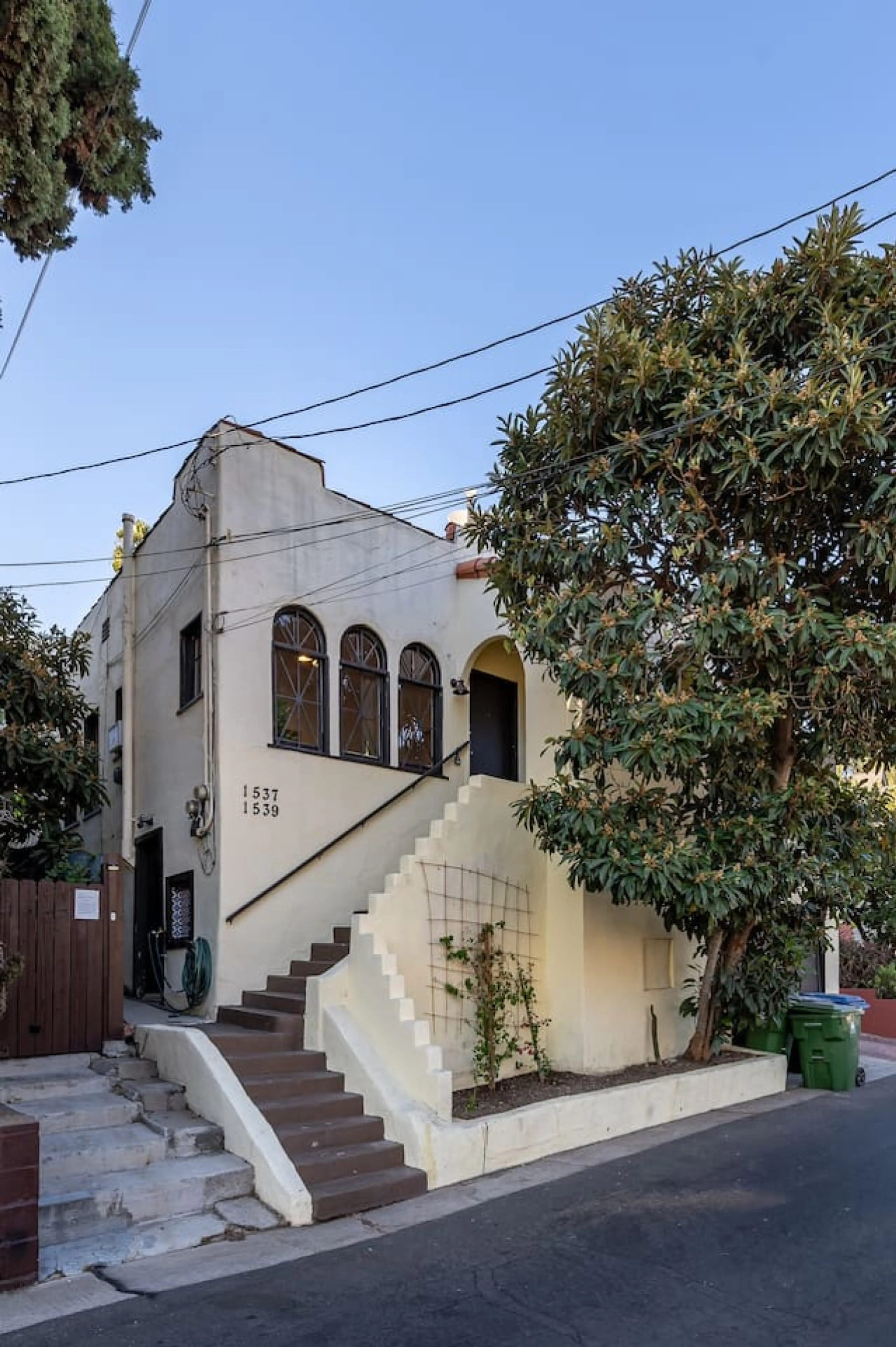 Welcome to Silver Lake Sunshine! Our charming front entrance invites you to a memorable stay in the heart of Silver Lake. With a walk score of 89, enjoy trendy cafes, local boutiques, and scenic parks just steps away. Your cozy retreat awaits!