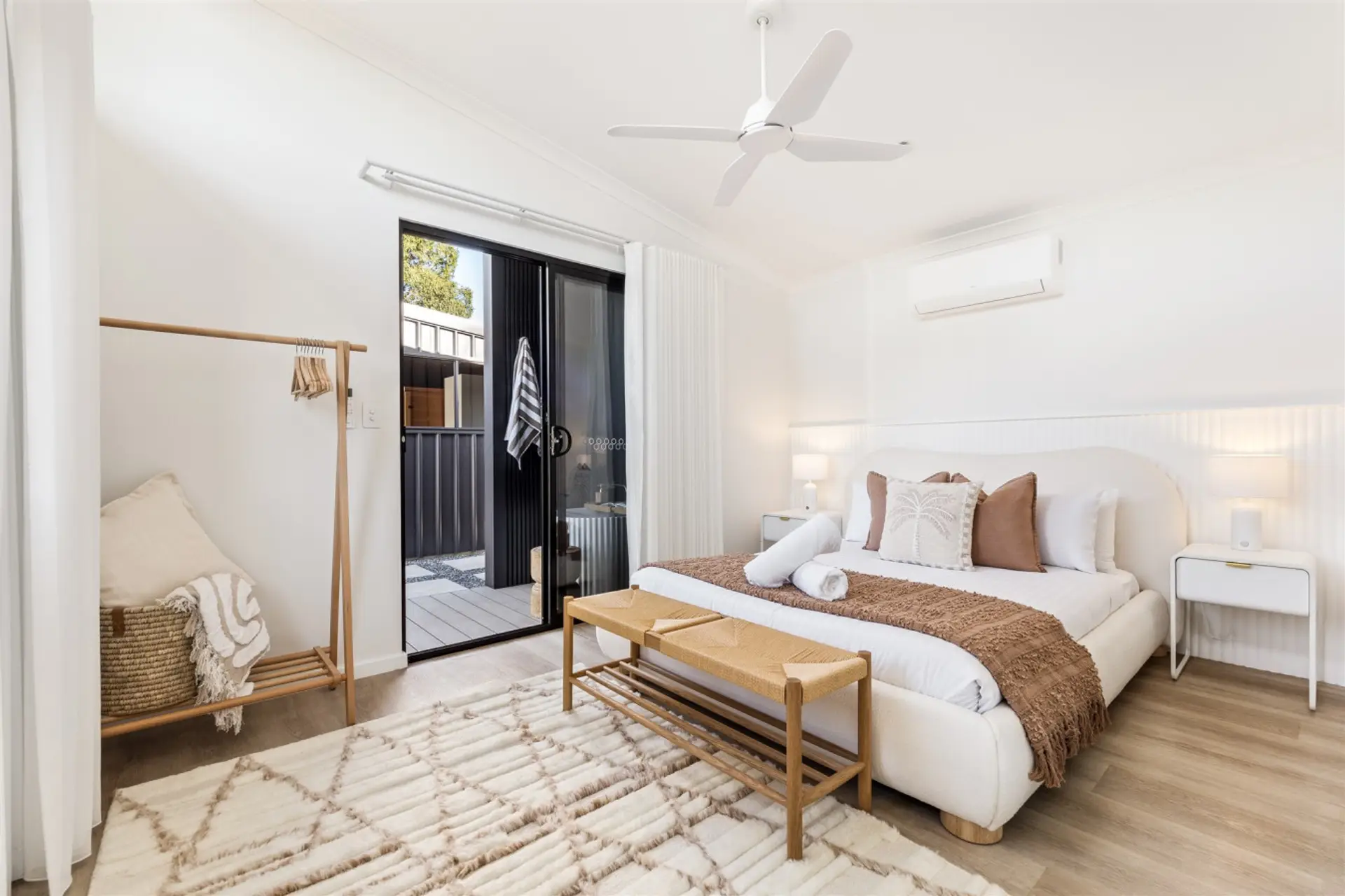 Main Queen bedroom leading to Outdoor Bath w/ Air-conditioning & Ceiling fan