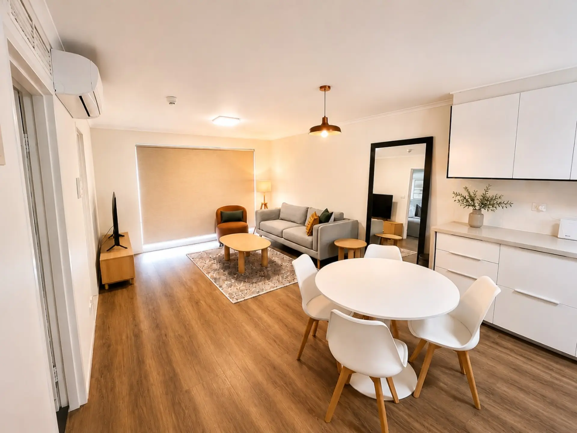 Welcome to a bright and inviting open-plan space, thoughtfully styled for relaxing, dining and enjoying quality time together. With warm timber floors, comfortable seating and plenty of natural light, it’s a lovely place to unwind after a day out.