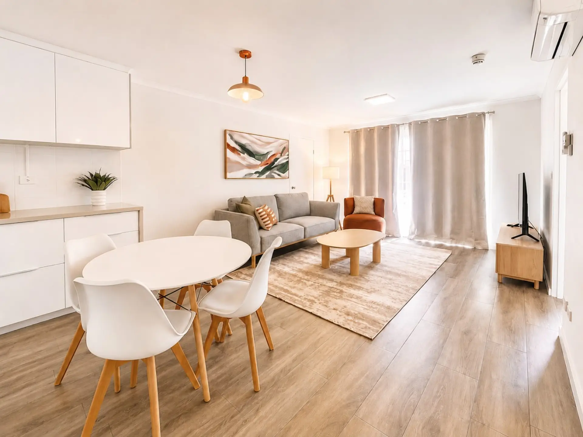 Gather, dine and relax in this light-filled open-plan space, where the dining area, modern kitchen and comfortable lounge come together beautifully. Whether you're sharing a meal, catching up over a coffee or enjoying a quiet evening, there's plenty of ro