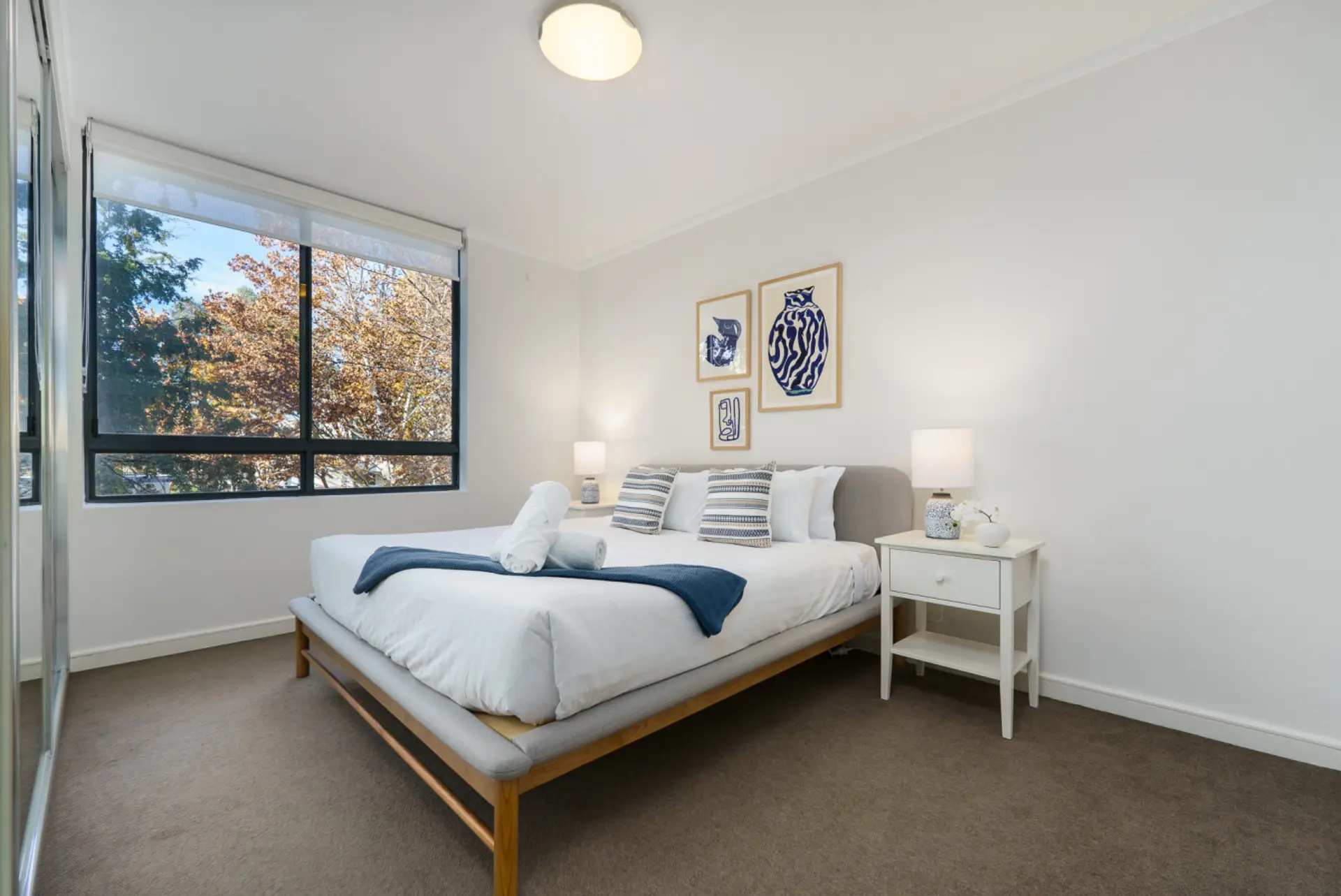 Sleep in a king bed with calming Mediterranean touches.