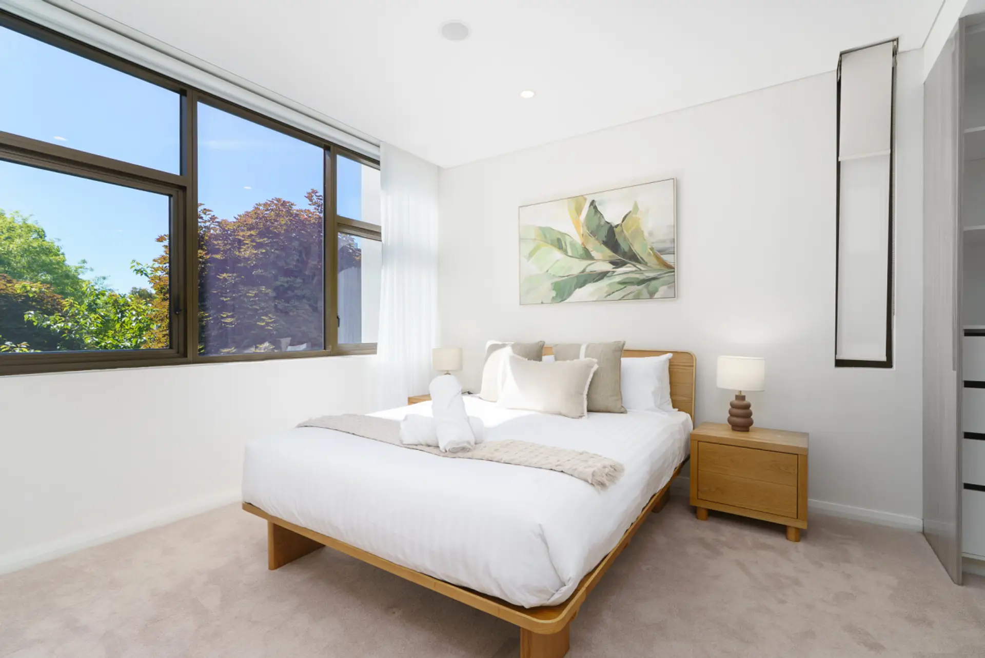 A serene bedroom retreat with soft textures and a clean, minimalist feel.