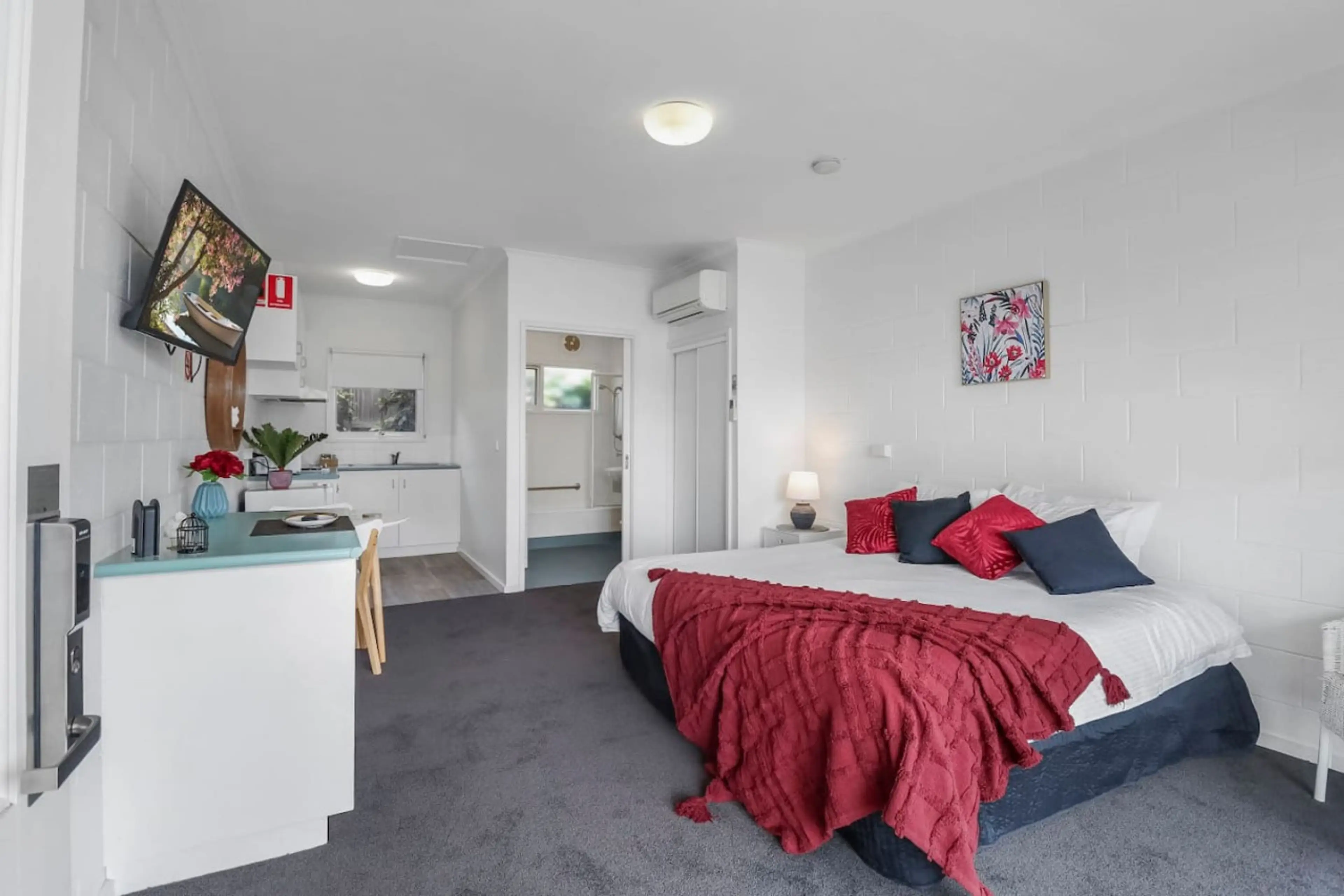 Large open-plan studio with private entrance, dining area, and individually controlled climate systems.