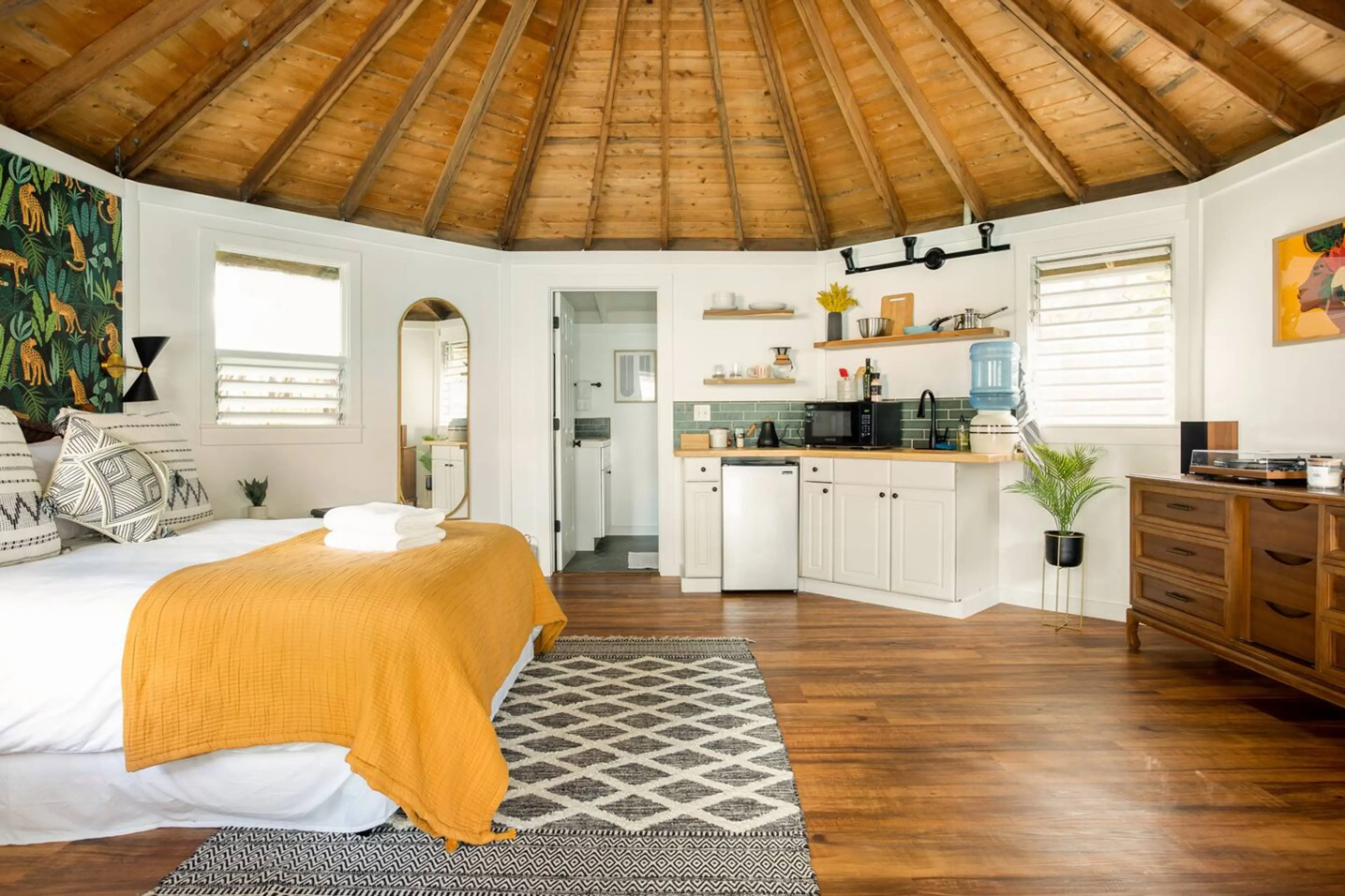 Fully stocked cottage with a queen bed, kitchenette, and full bathroom