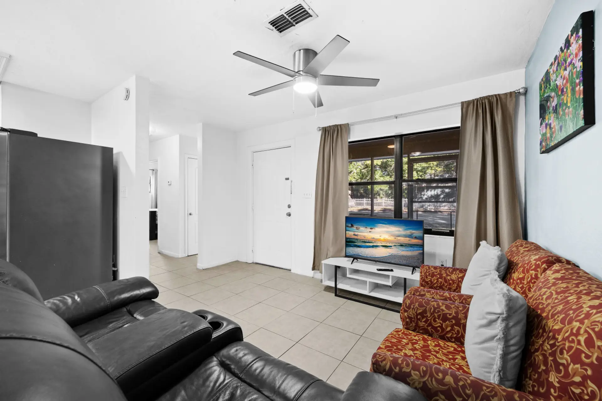 Comfortable living room with large screen TV