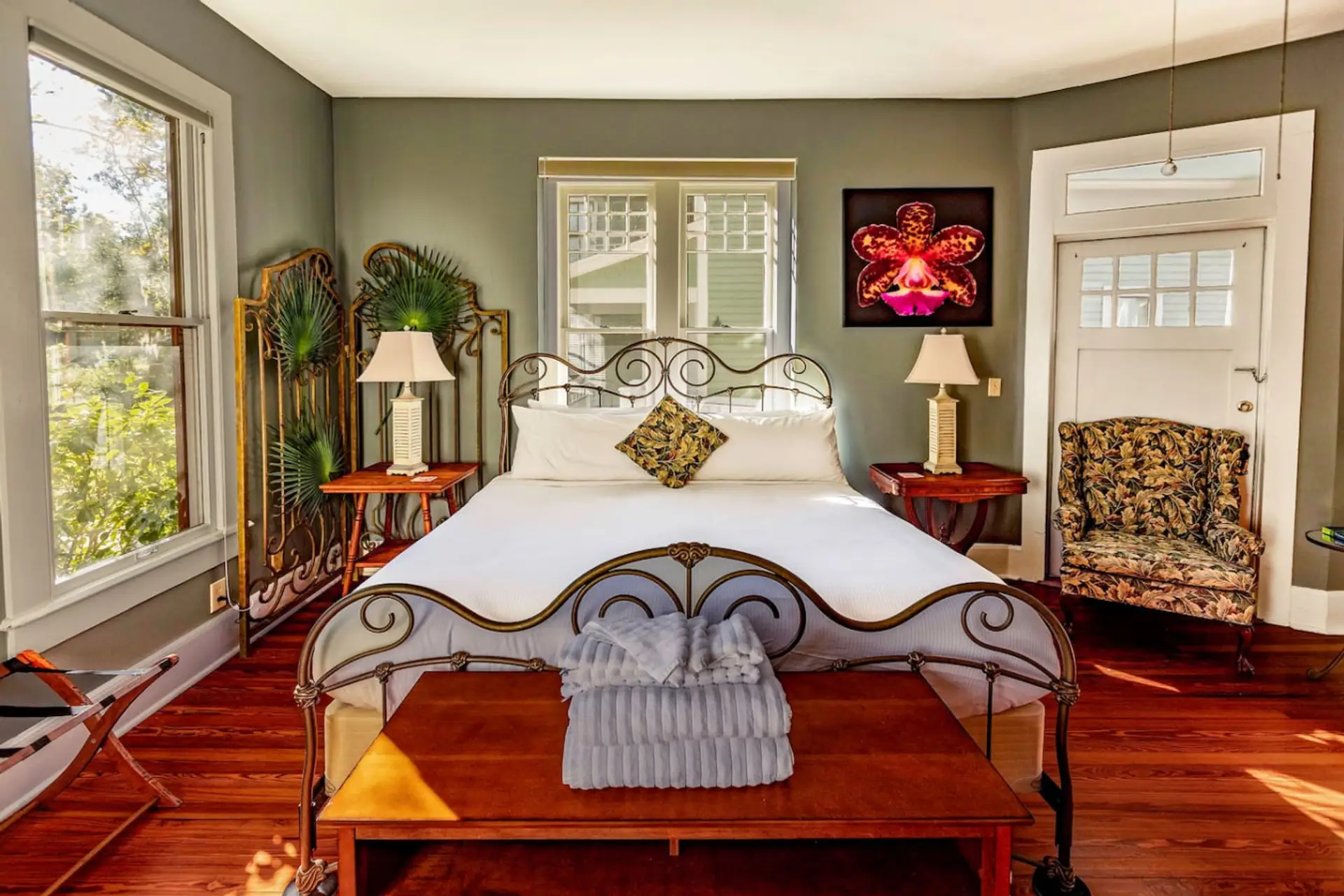 King bed in a bright room (with shades)