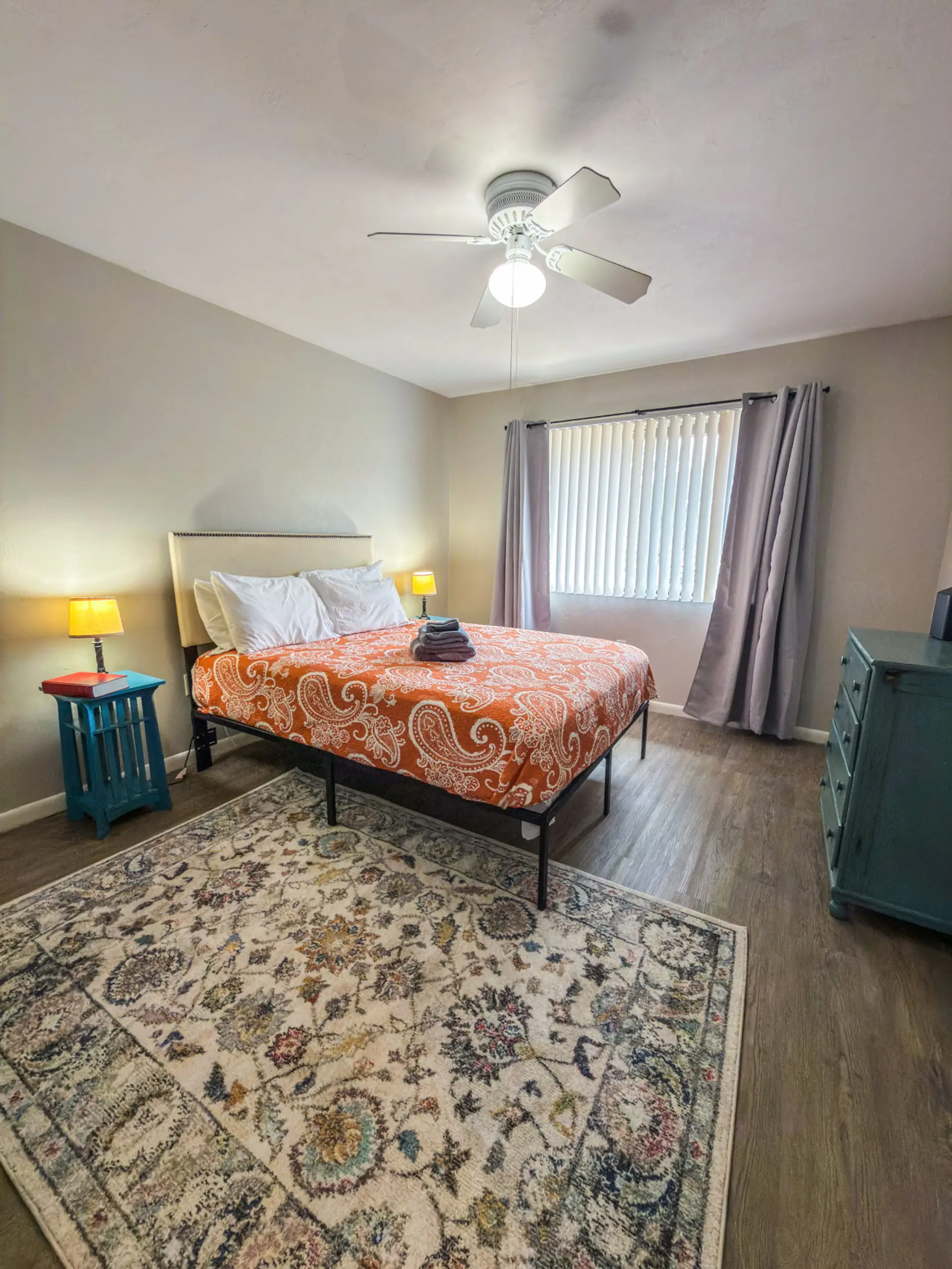 Cozy queen bedroom with plenty of storage space