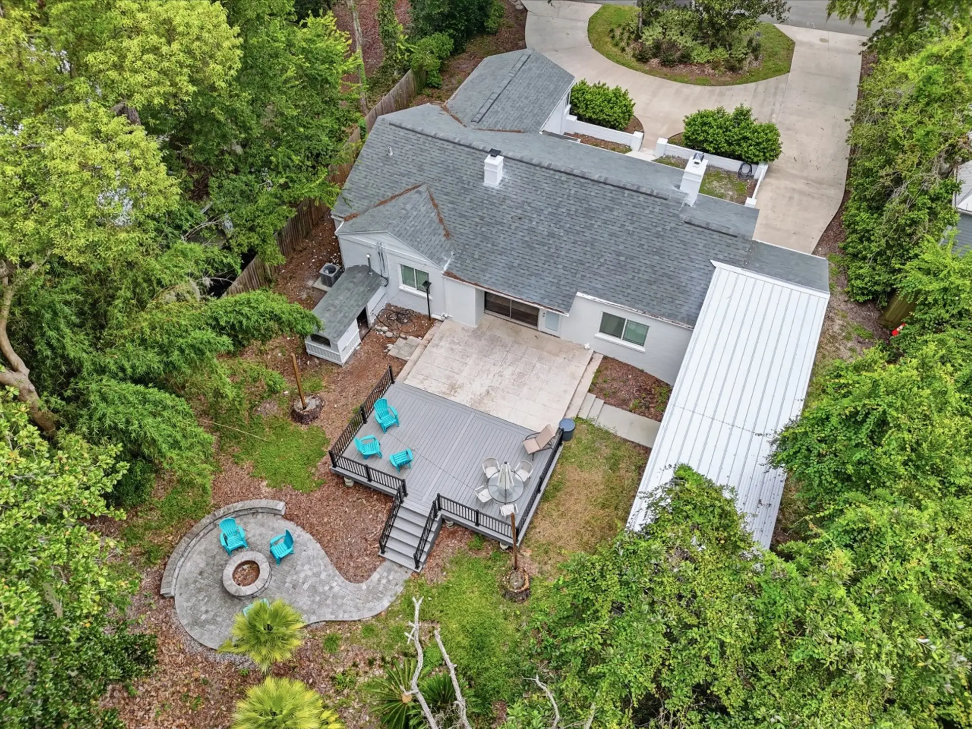 Backyard Retreat: Your own private backyard escape with deck, firepit, and multiple spaces to gather.