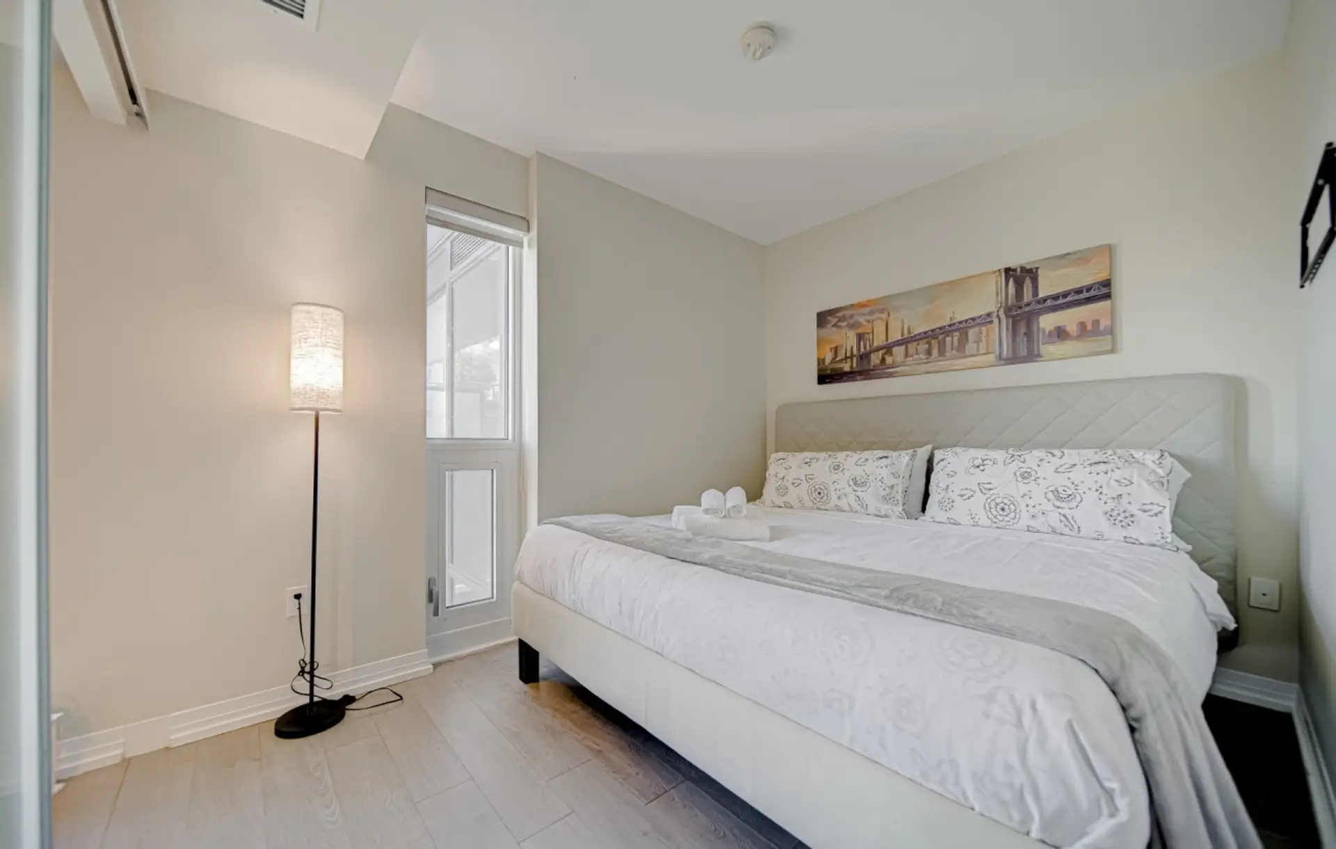 Modern bedroom with a blend of comfort and style.