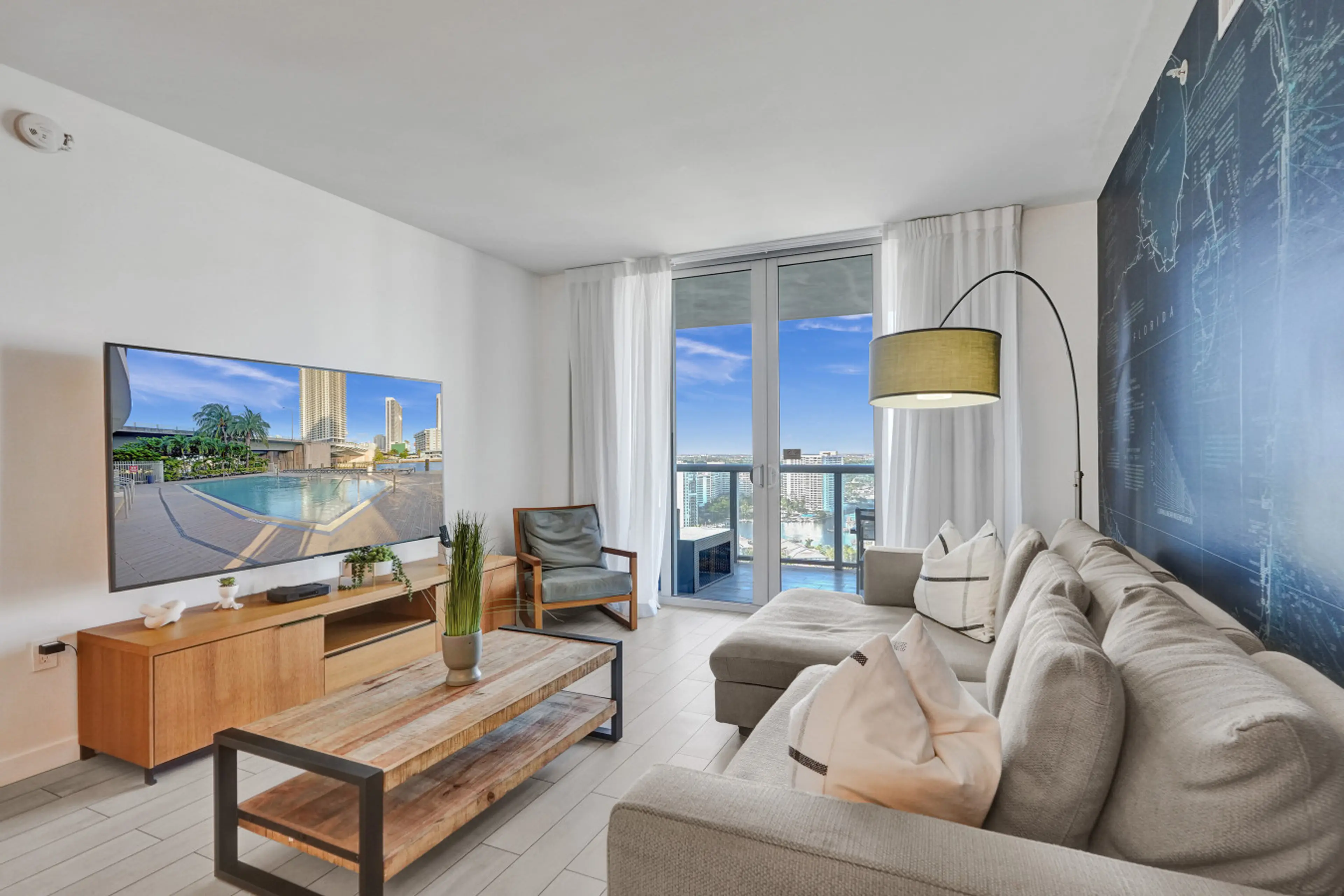 Modern open space living room with City and Canal view