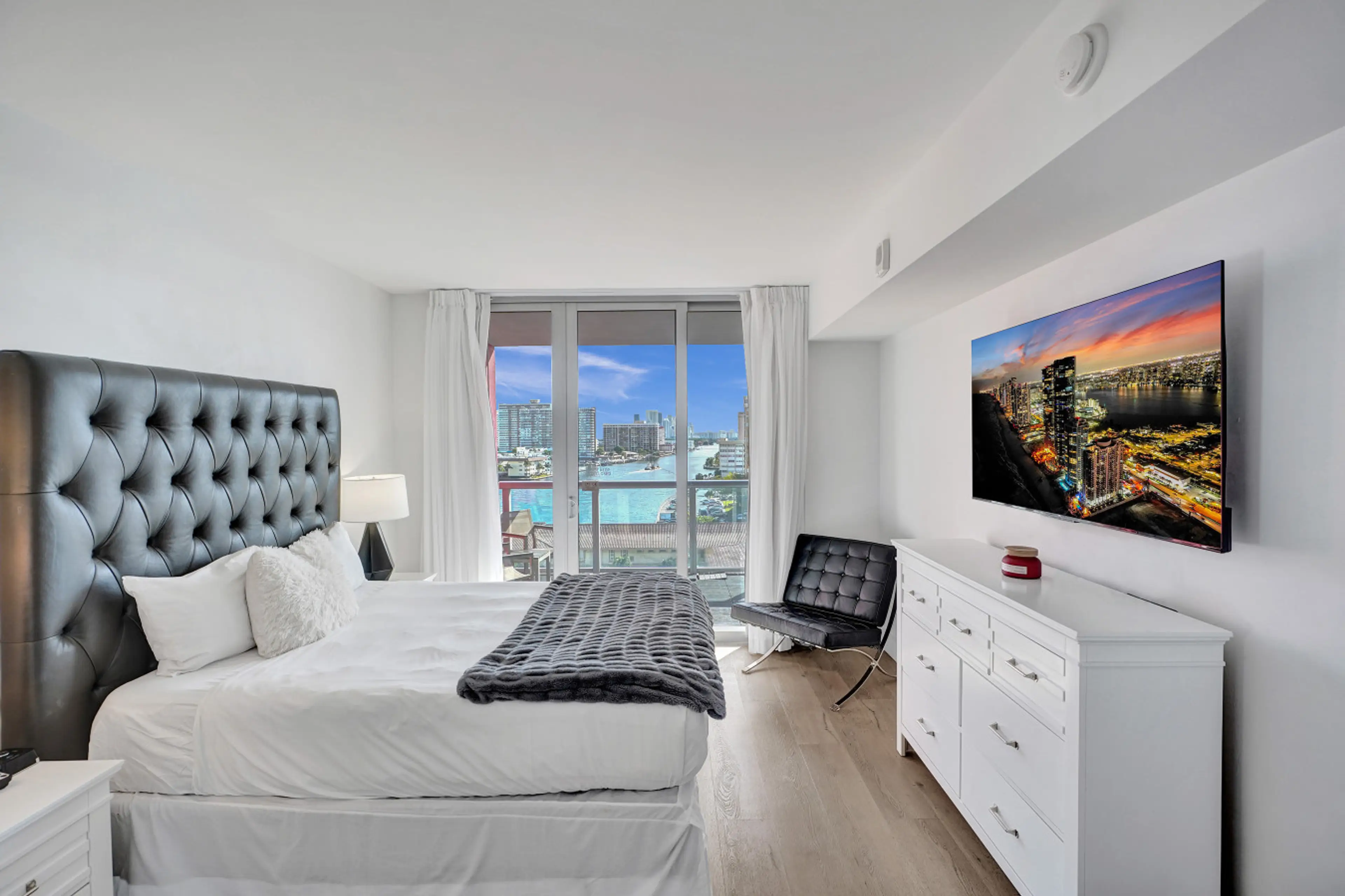 Master bedroom with king size bed and a Canal view