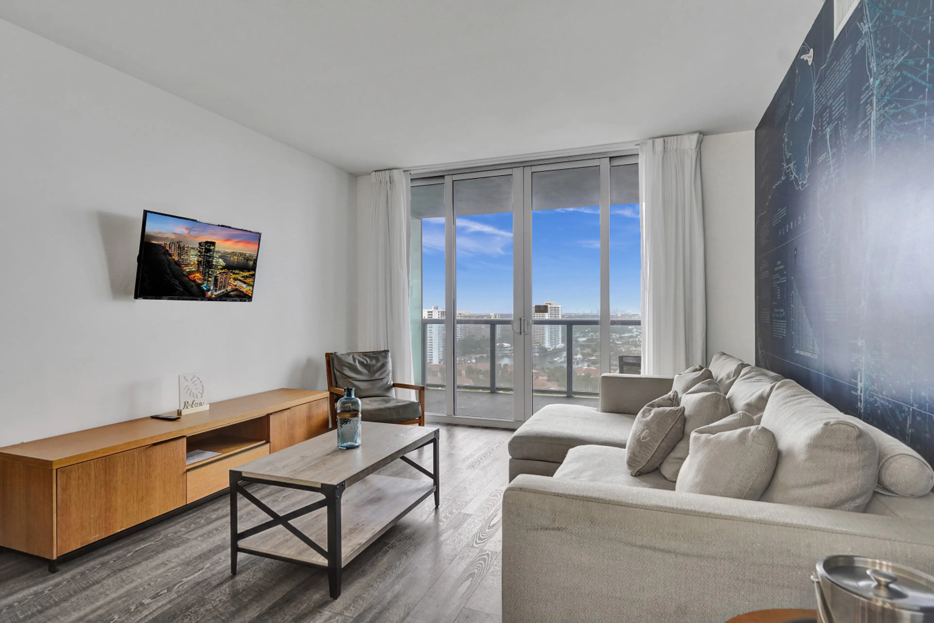 Cozy open space living room with city and Canal view