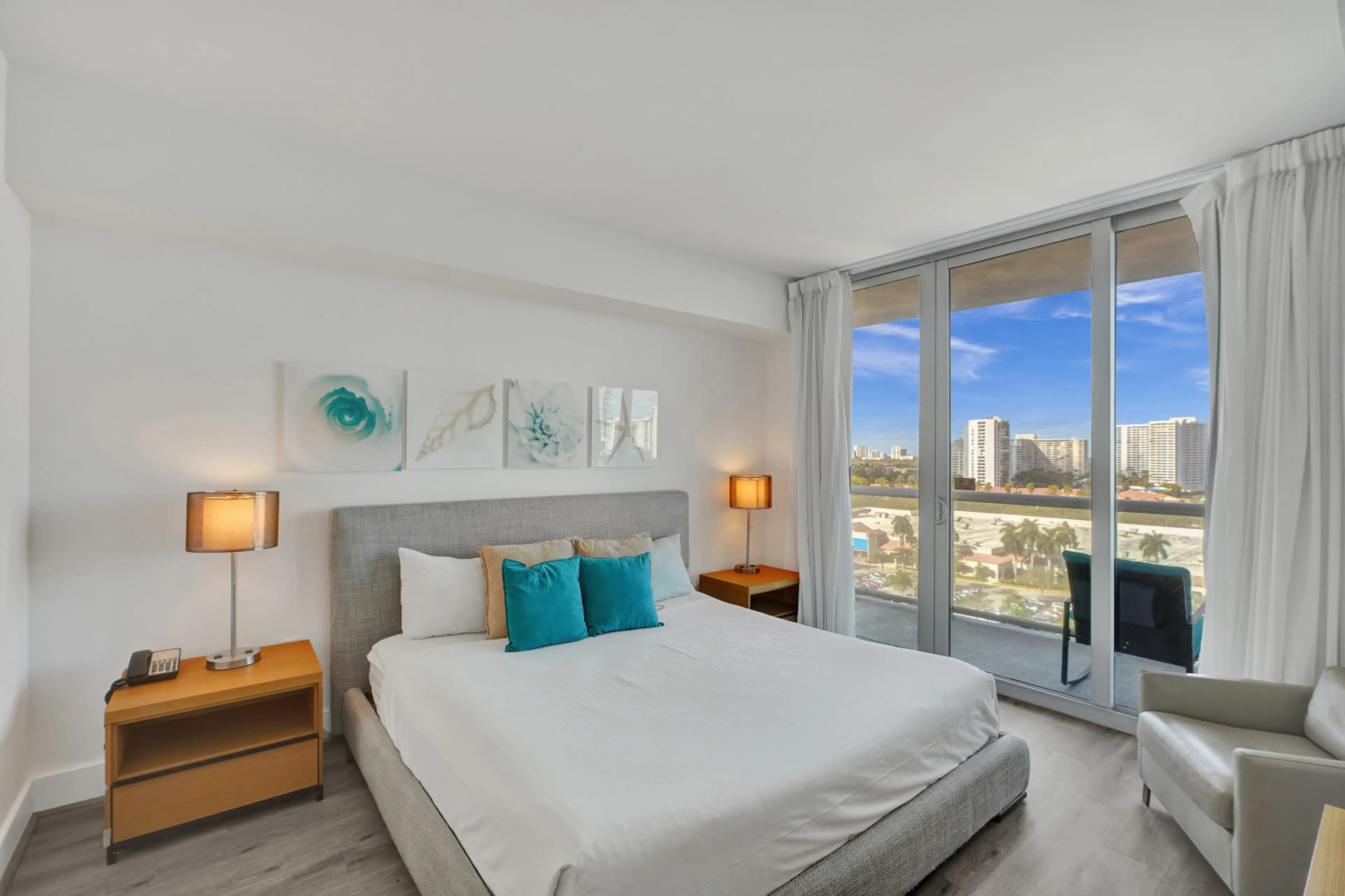 Master bedroom with king size bed and city view