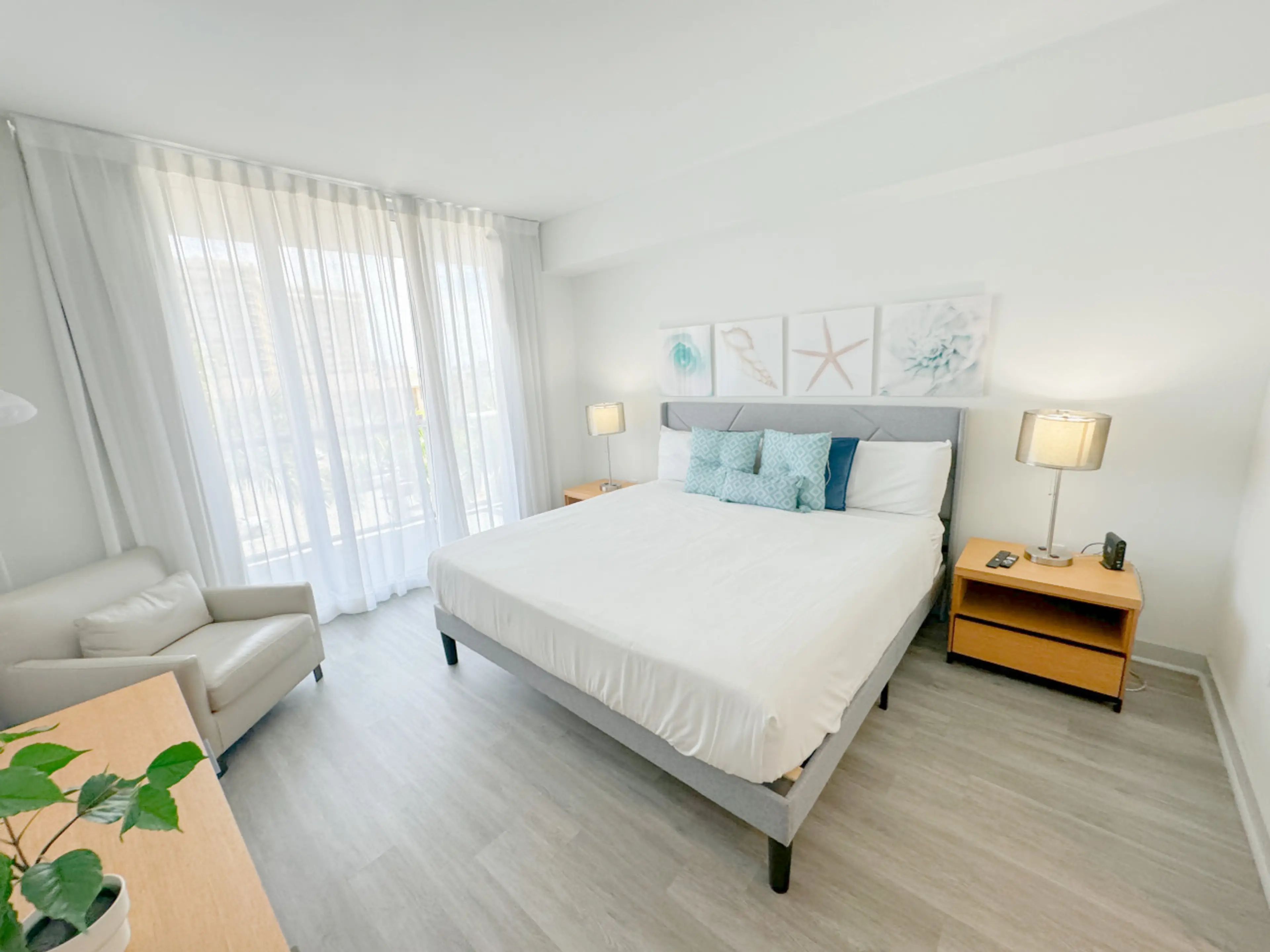 Bright and cozy master bedroom with natural light.