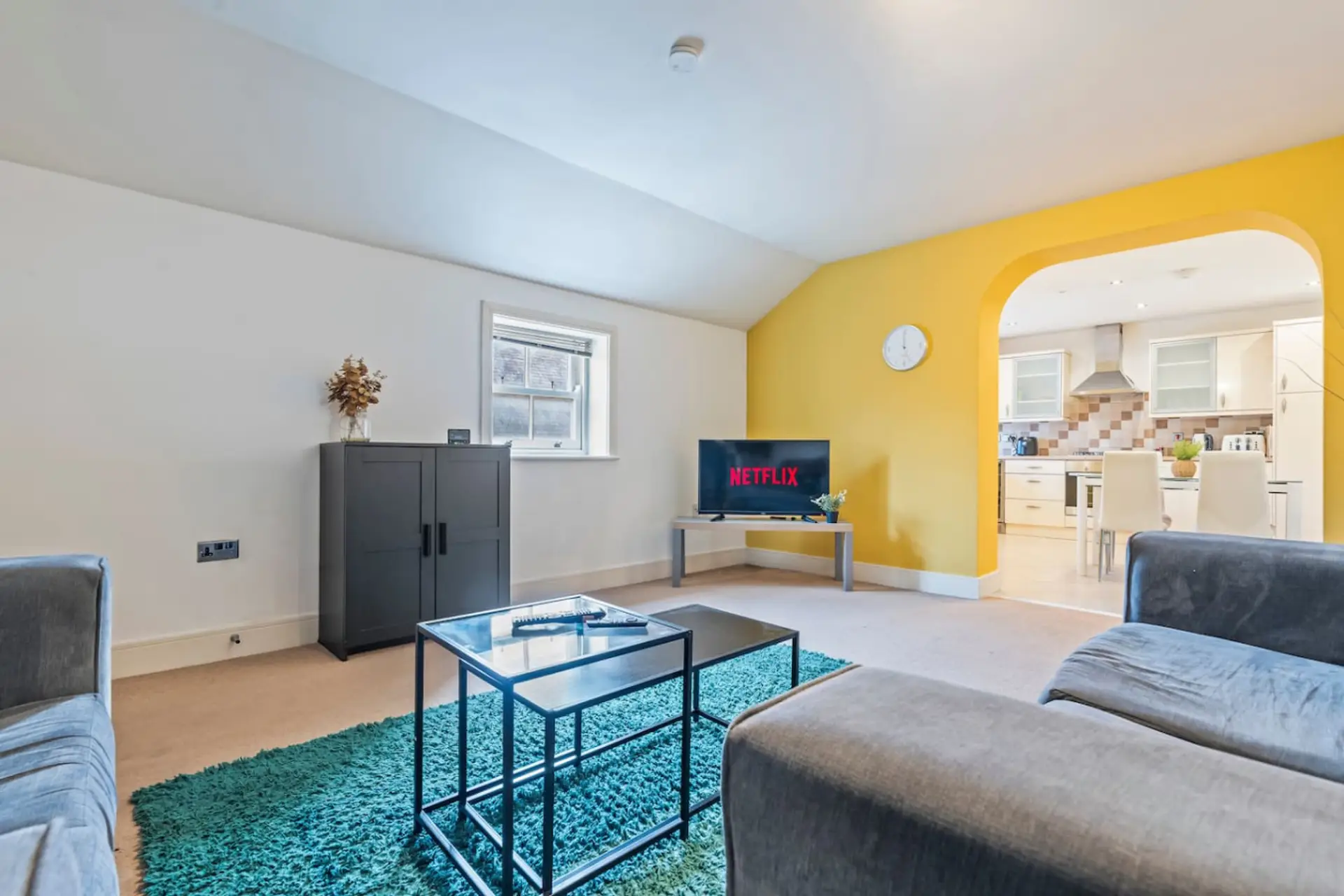 A bright and welcoming living space, perfect for relaxing, socialising, or enjoying a quiet evening after a busy day. (Rich Property Management)