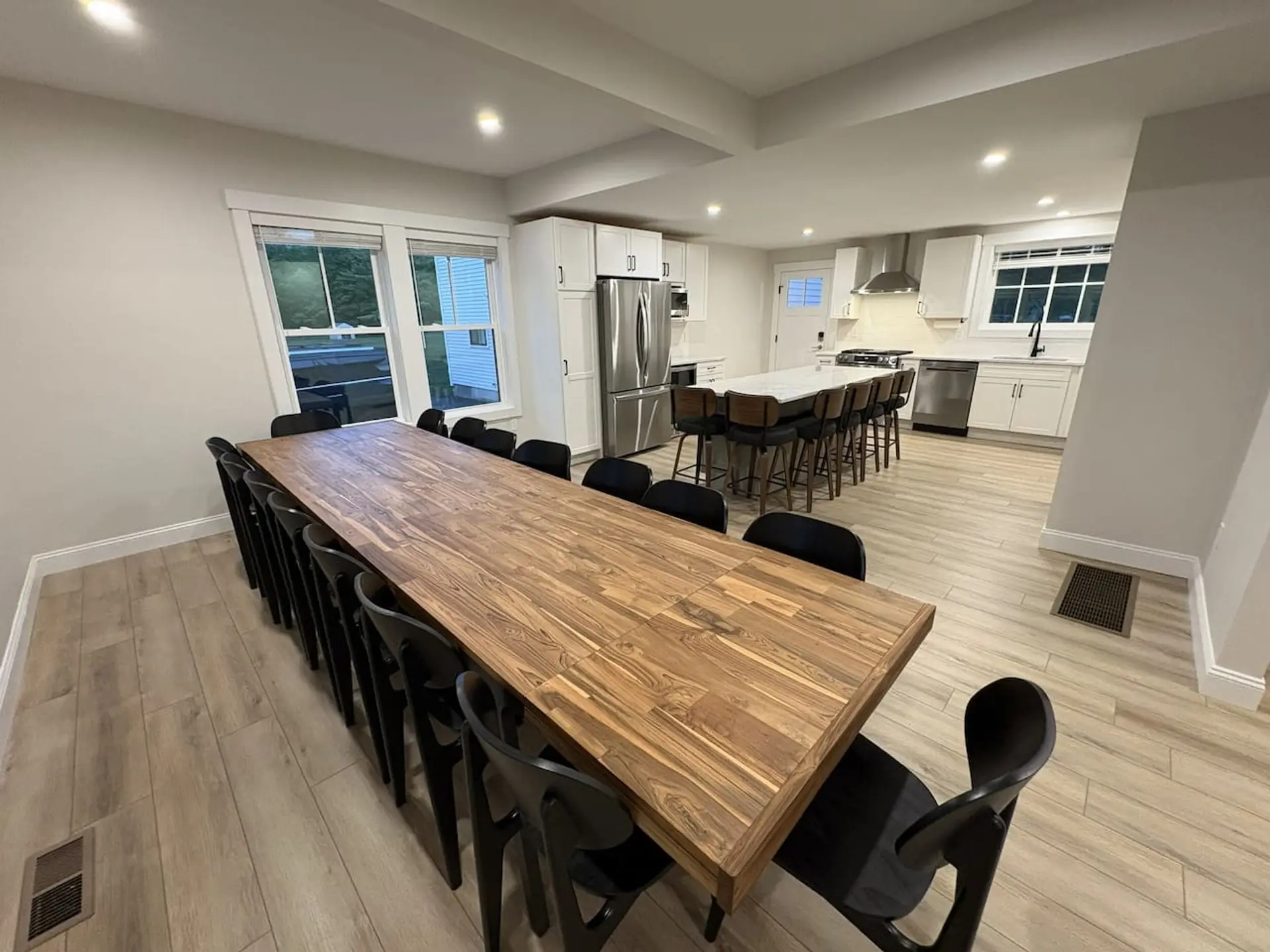 Big House Kitchen: Open concept kitchen/dining room with brand new stainless steel appliances and a huge dining table and oversized quartzite island perfect for entertaining and those large group meals