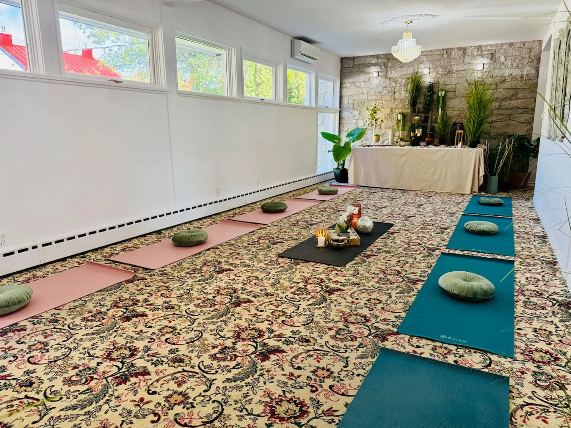 A peaceful yoga and meditation space prepared for retreats, wellness sessions, or workshops.