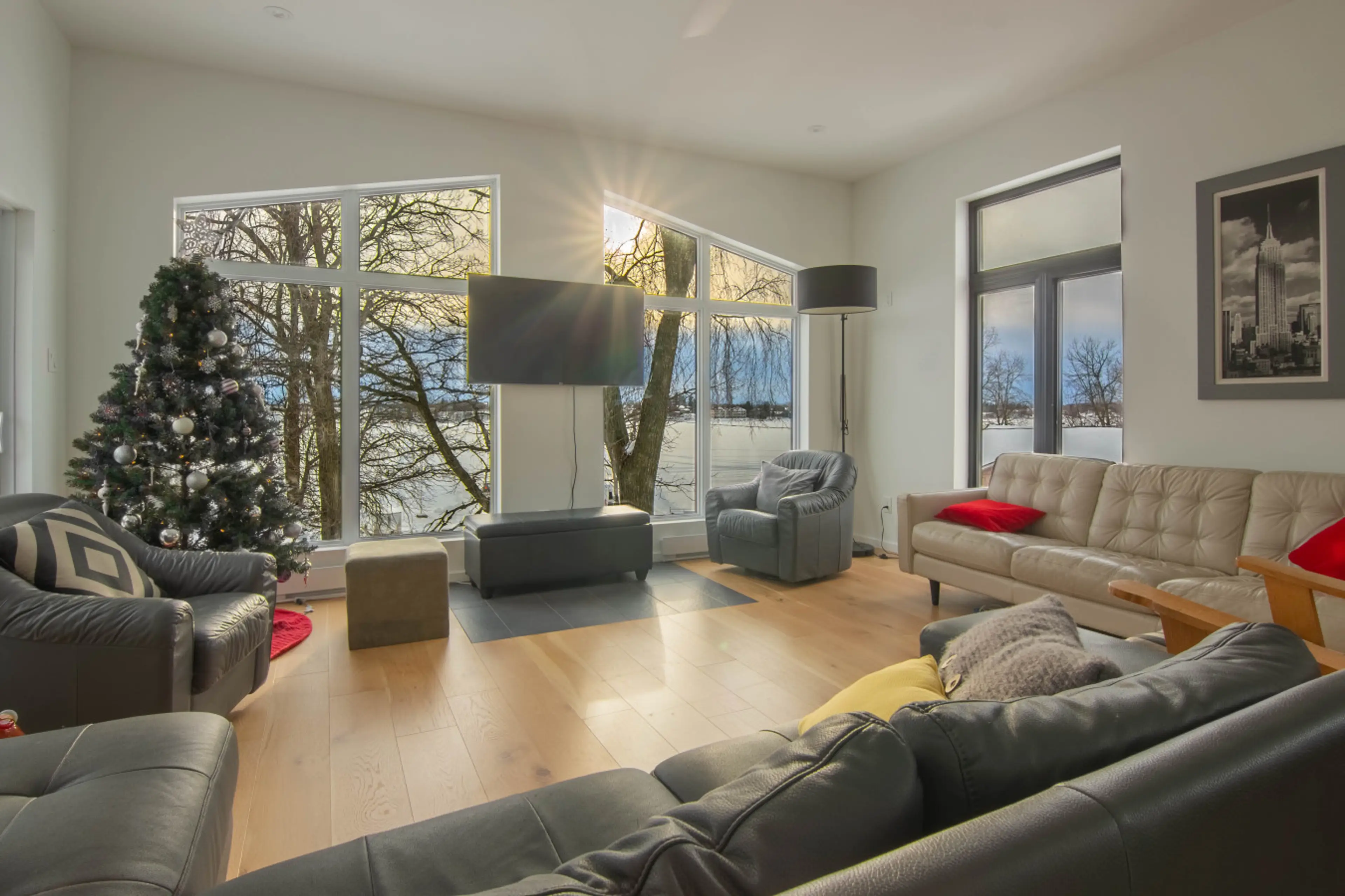 Large and inviting living room filled with natural light, perfect for gathering