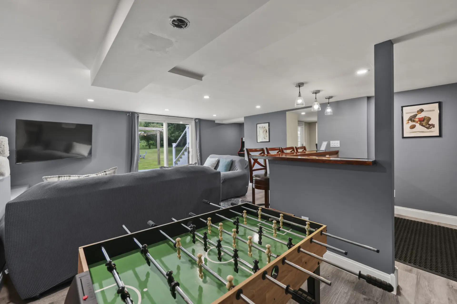 Fun-filled game room featuring a foosball table for hours of entertainment.