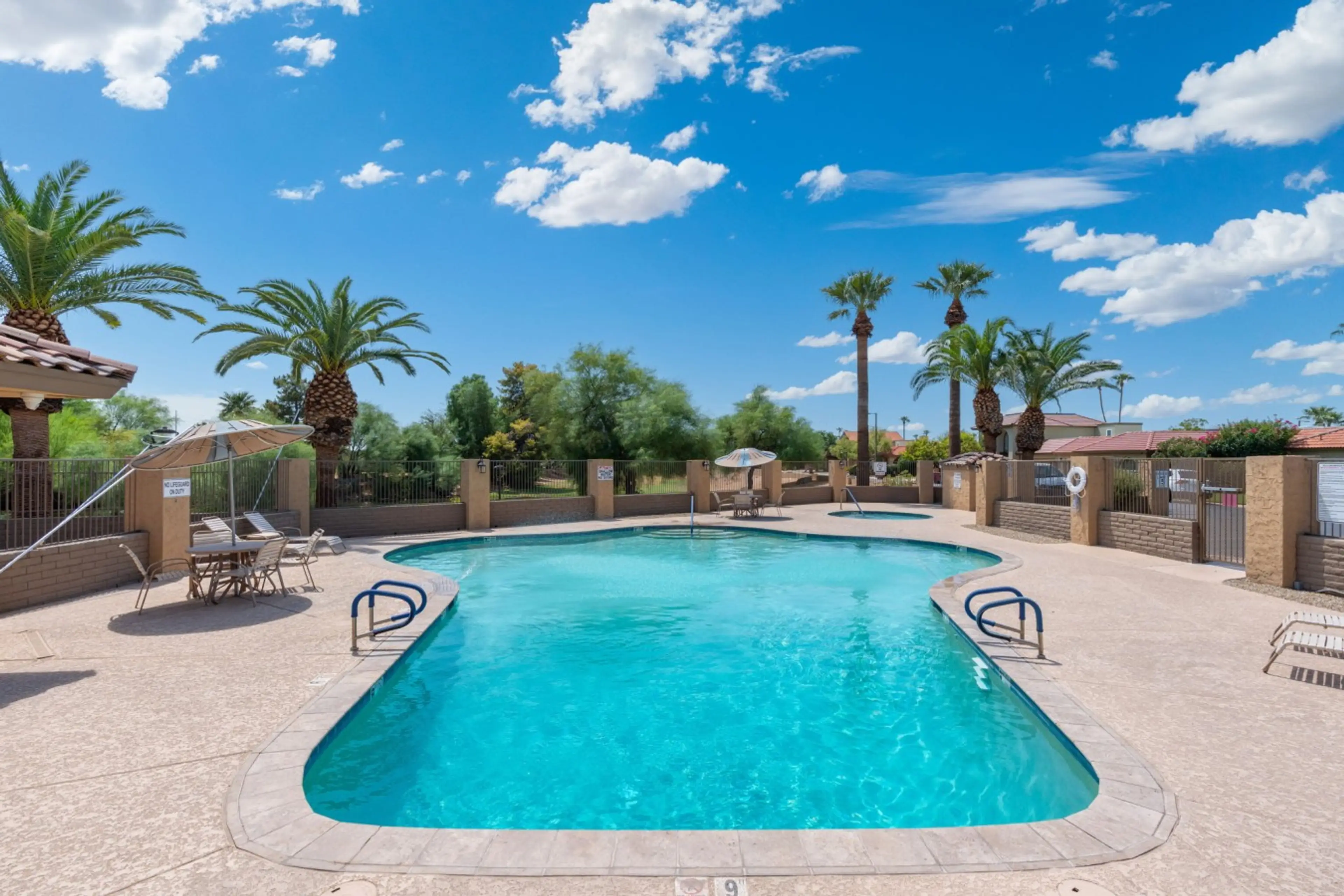 Spend sunny afternoons poolside with plenty of space to lounge, swim, and unwind.