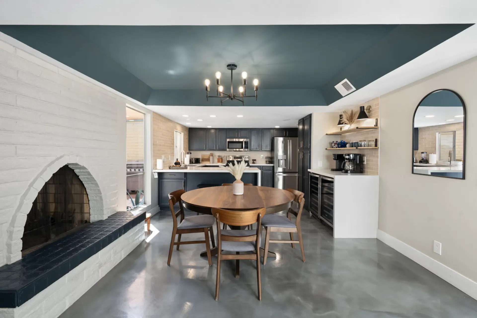Gather around the dining table and enjoy an open-concept space designed for meals and connection.