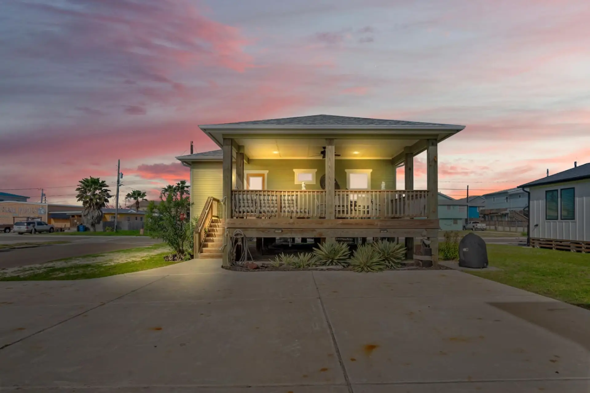 "Golden hour glow on this charming beach retreat – your peaceful coastal escape awaits!"