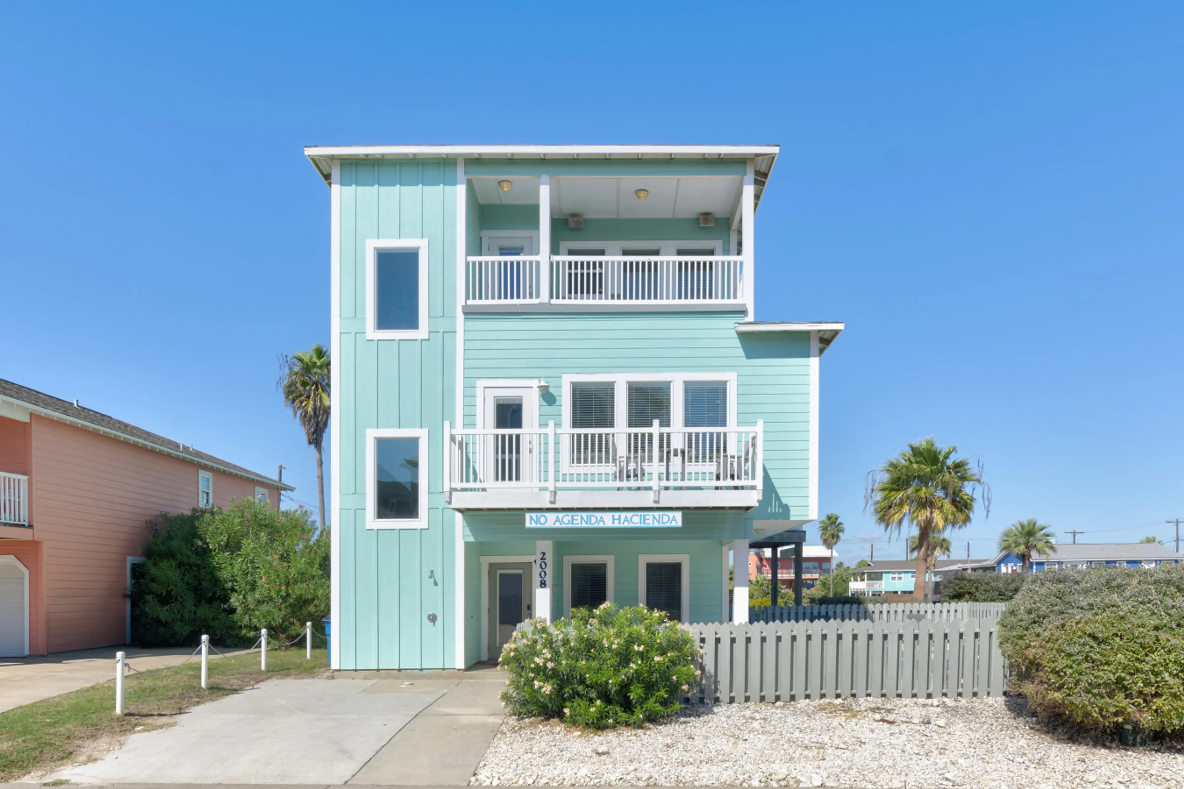 Coastal charm meets modern comfort in this bright beach retreat
