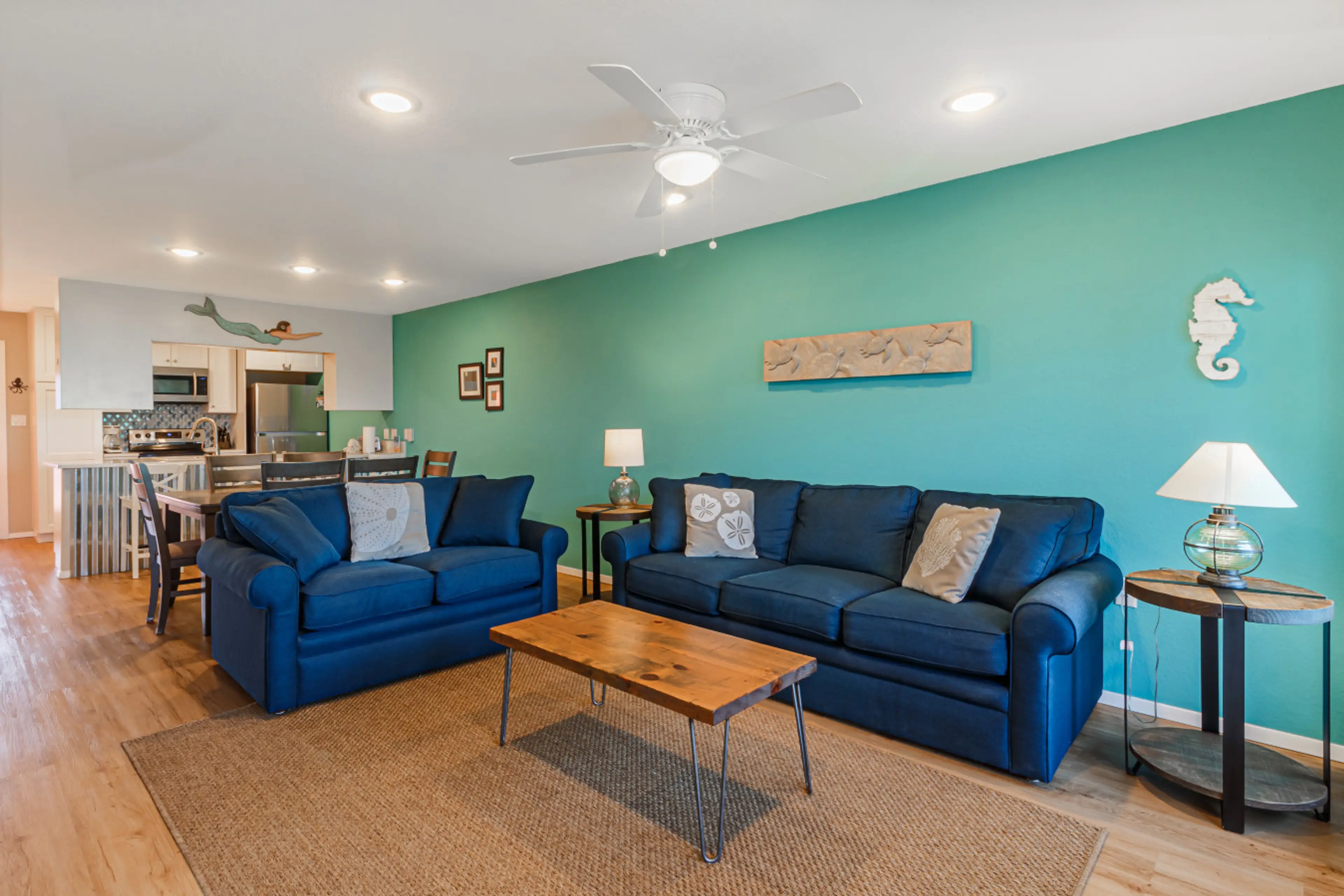 Bright coastal living room with open layout