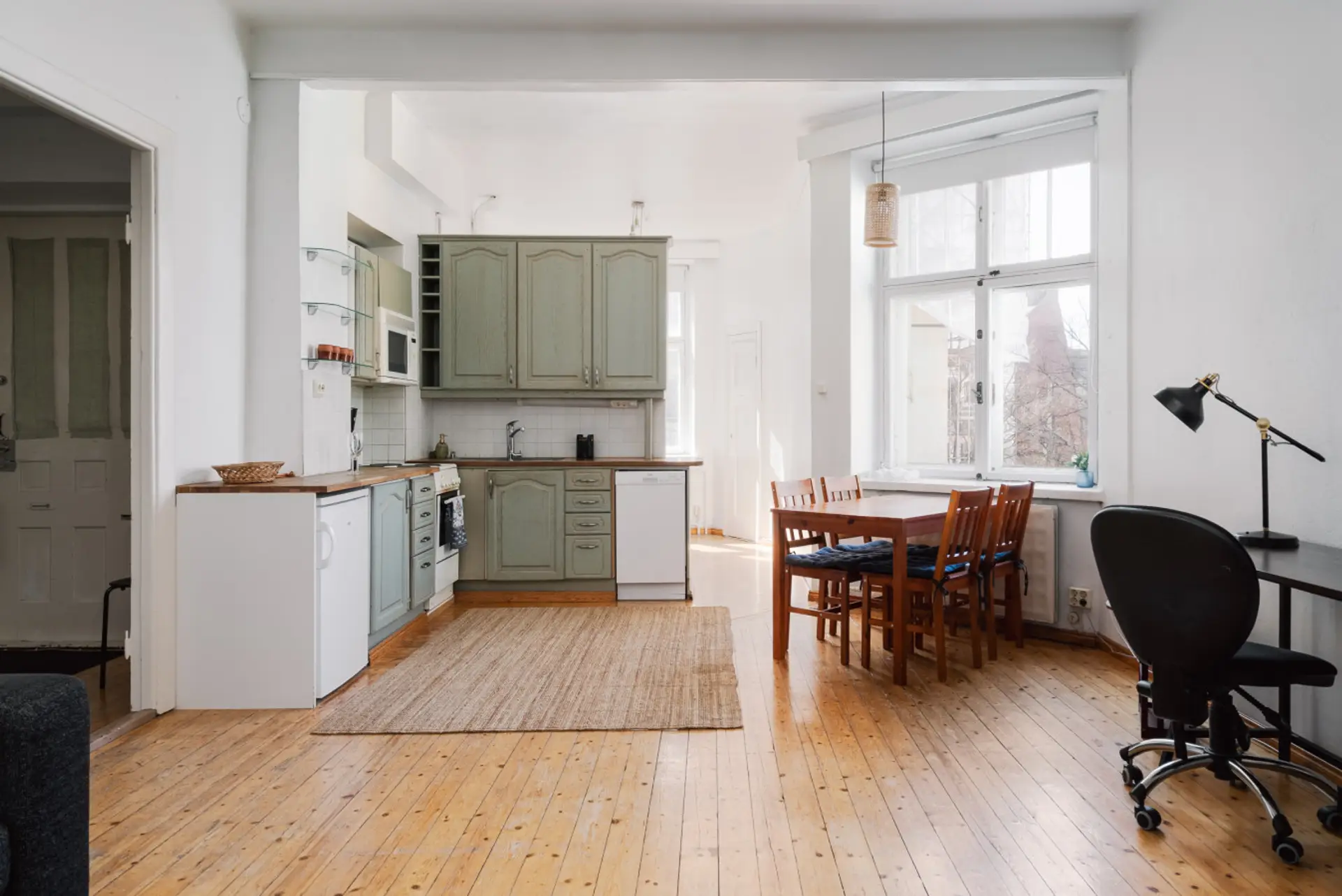Whether you're preparing a quick breakfast or entertaining friends over dinner, the open layout keeps everyone connected and the space feeling bright and airy.