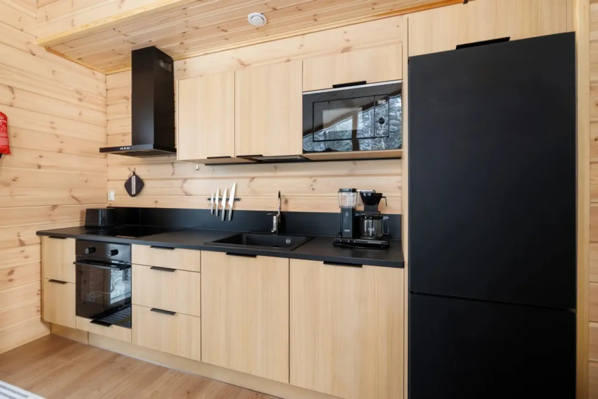 The fully equipped kitchen features high-quality appliances and everything you need to prepare delicious home-cooked meals during your stay.