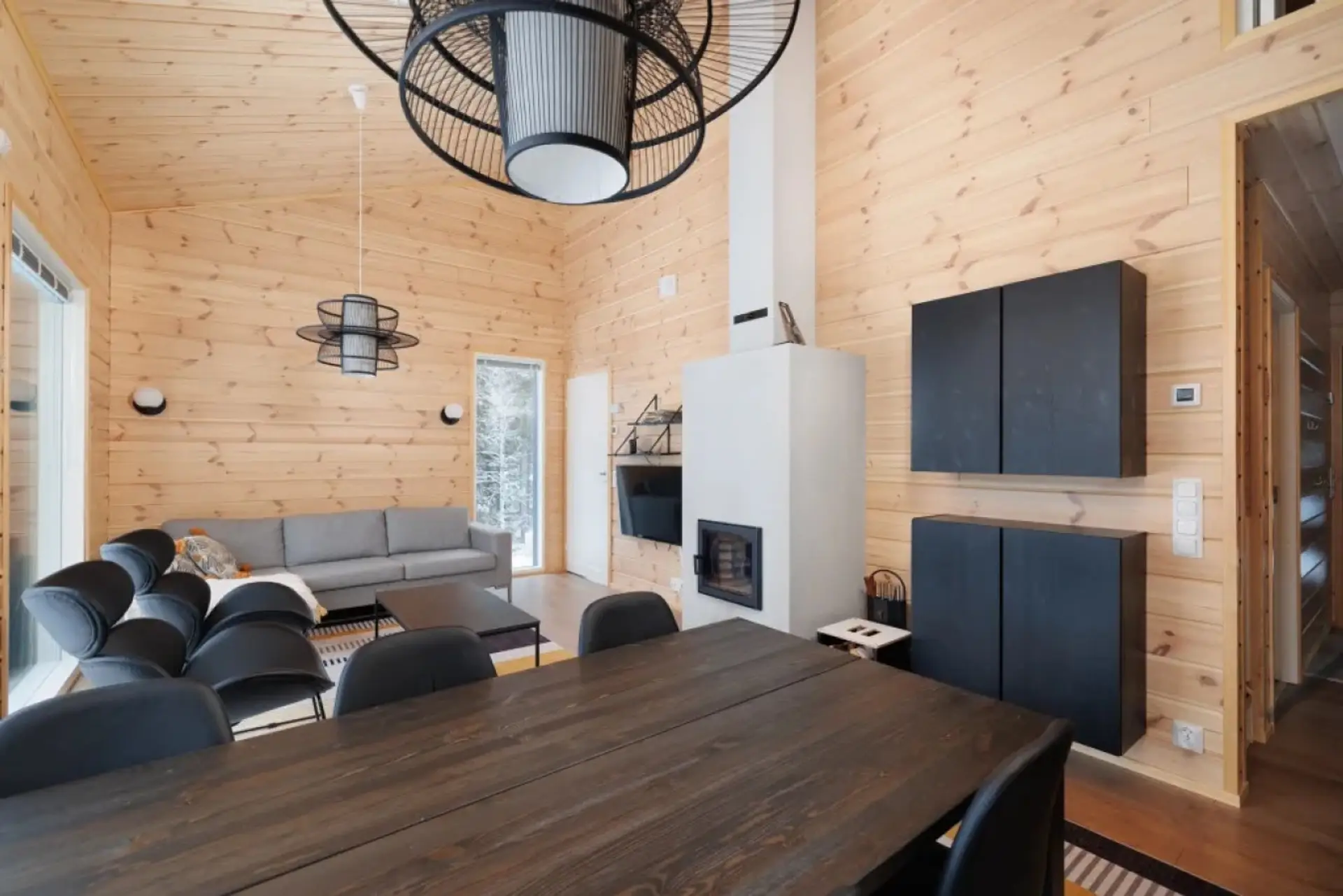 Stay cozy during winter evenings by the modern fireplace, with plenty of comfortable seating for the whole group to gather after a day on the slopes.